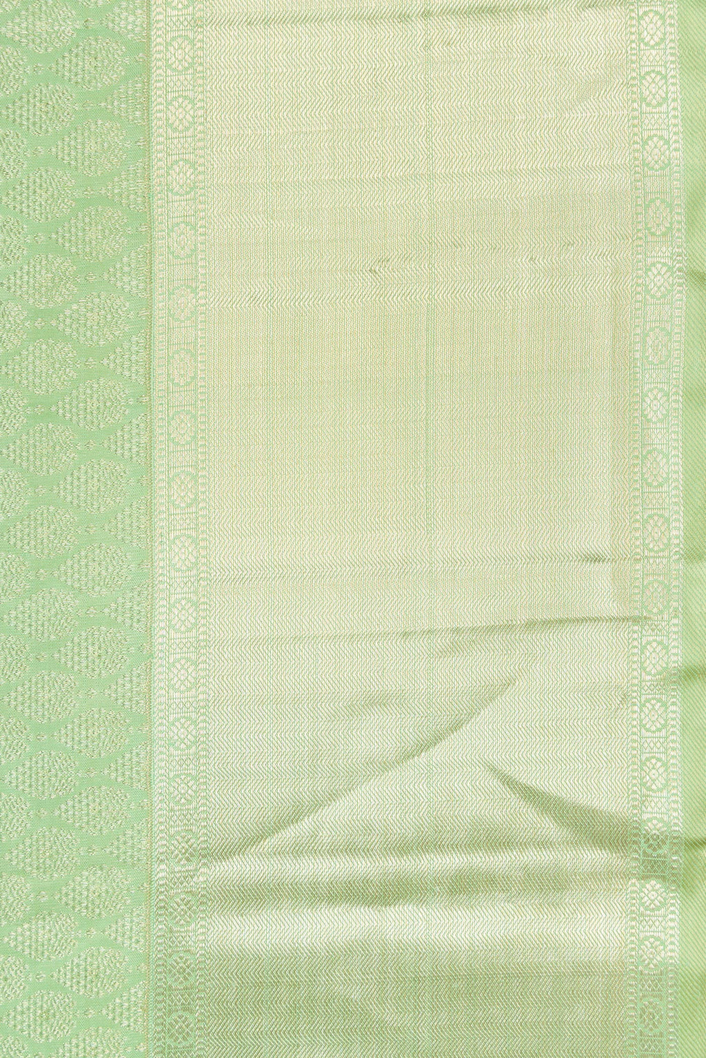 Border image of Pista Green Dual Tone Kanchipuram Silk Saree with Zari Brocade on the body and Zari Border. 