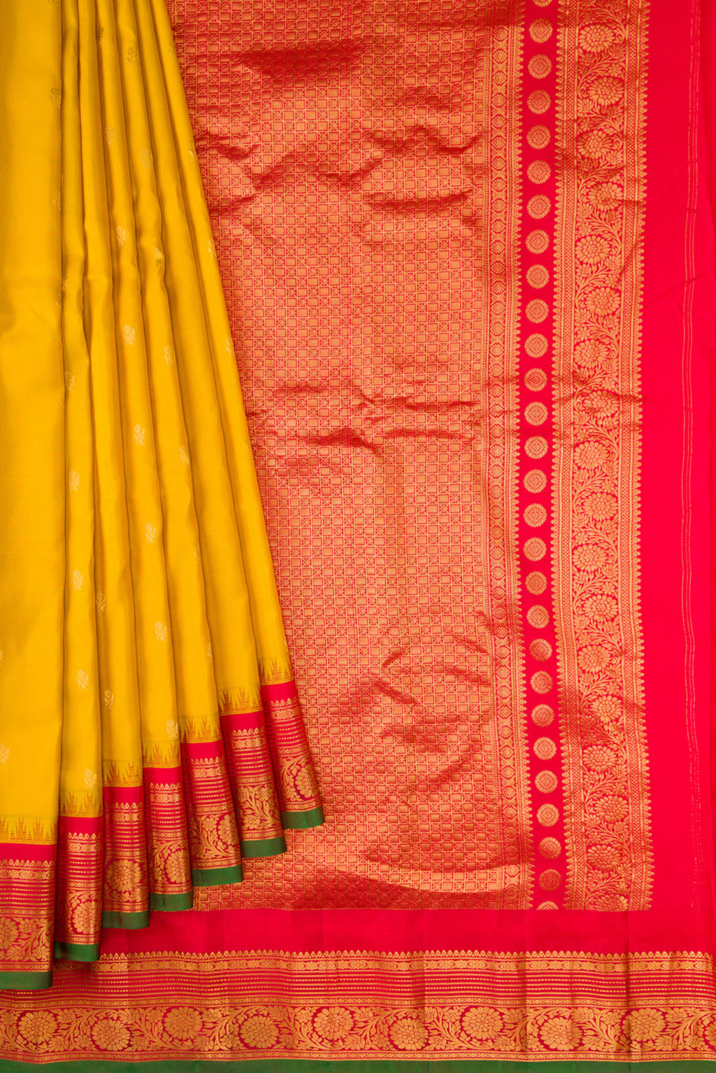 Pleats and pallu of Mustard Dual Tone Gadwal Silk Saree with Zari Butta on the body and Zari Border. 