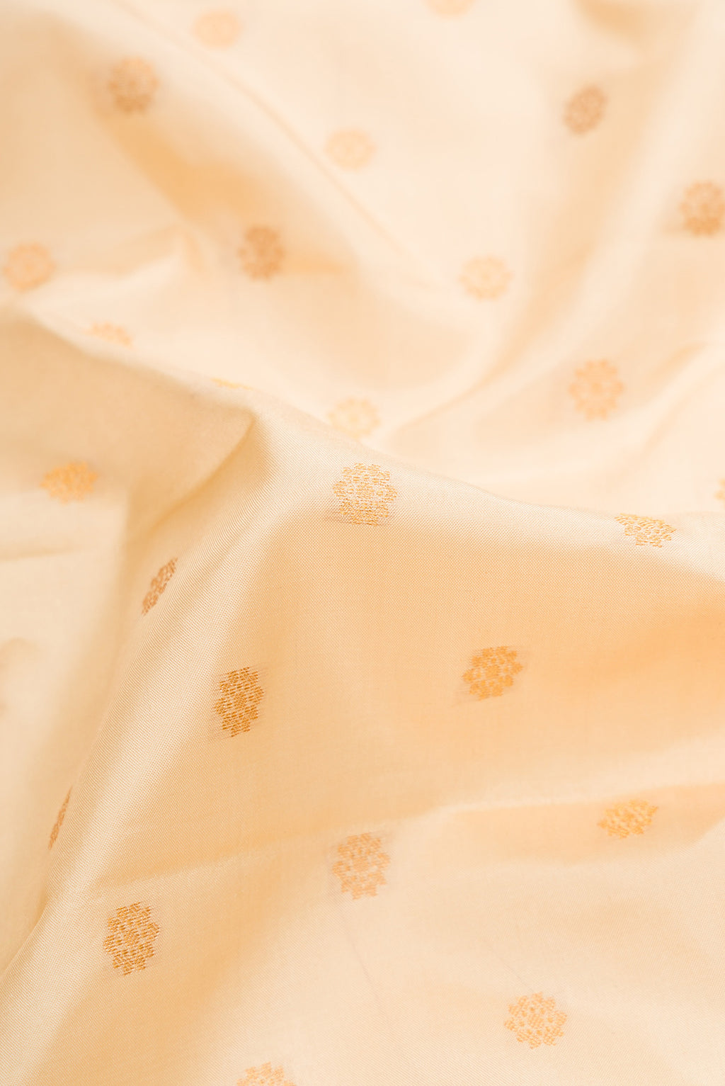 Close up of Sandal Dual Tone Gadwal Silk Saree with Zari Butta on the body and Zari Border.  displaying folds
