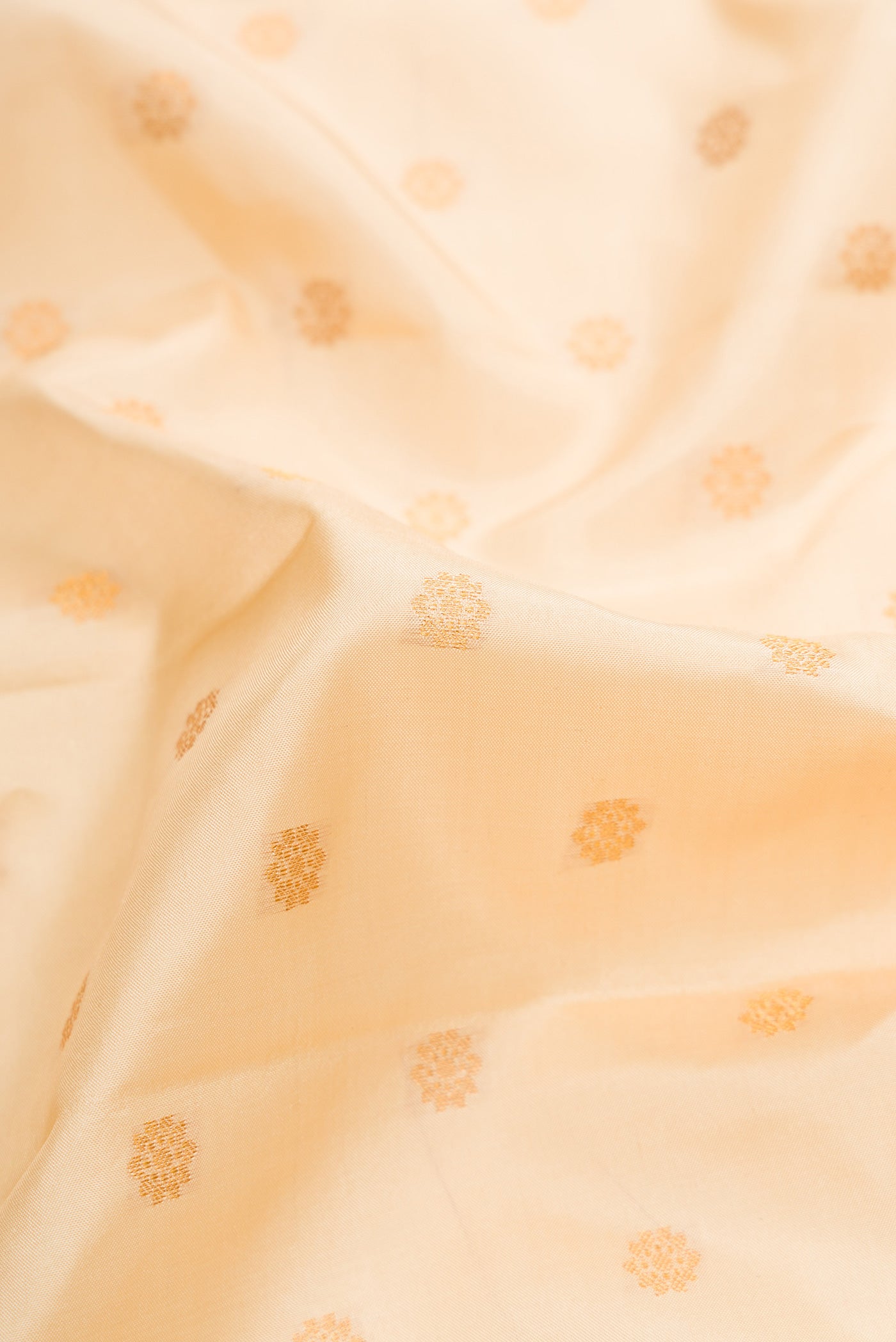 Close up of Sandal Dual Tone Gadwal Silk Saree with Zari Butta on the body and Zari Border.  displaying folds