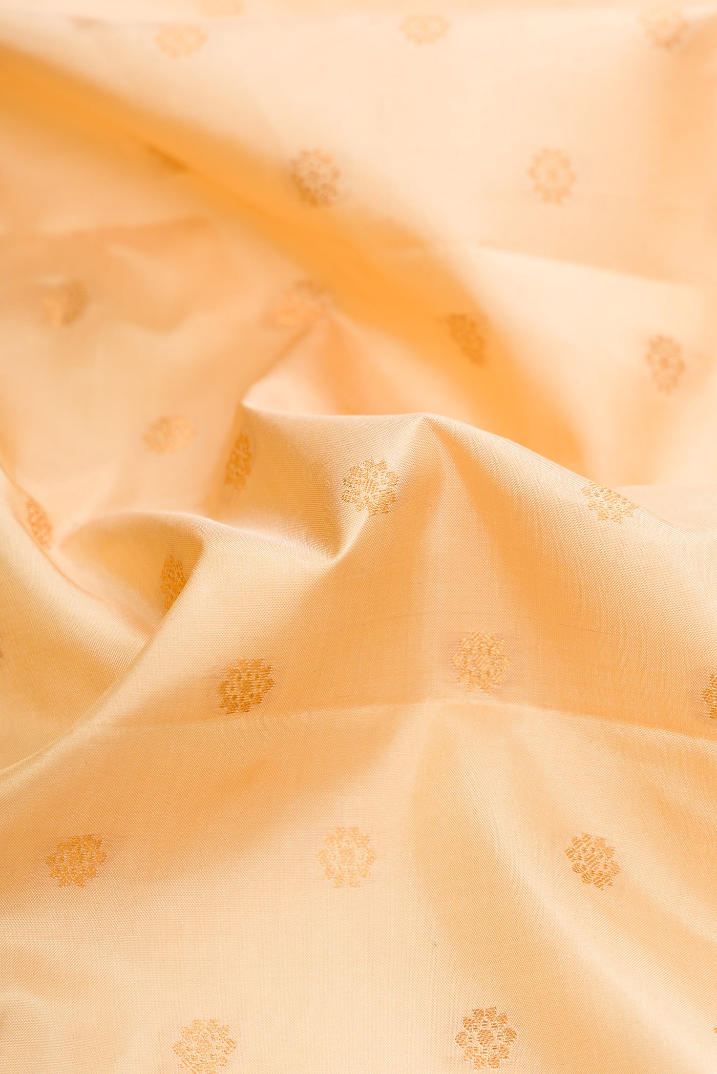 Close up of Sandal Dual Tone Gadwal Silk Saree with Zari Butta on the body and Zari Border.  displaying folds