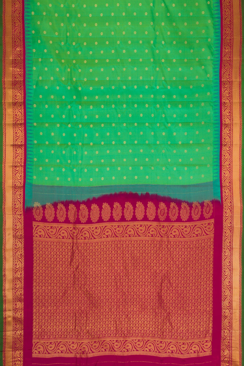 Flat view of Green Dual Tone Gadwal Silk Saree with Zari Butta on the body and Zari Border. 