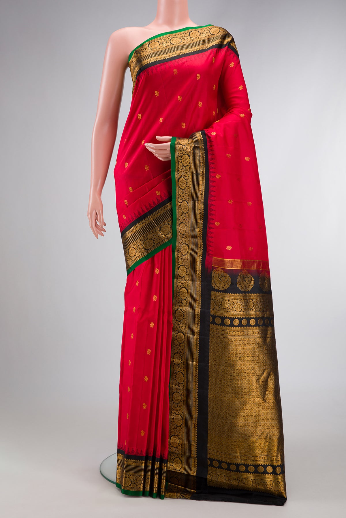 Red Dual Tone Gadwal Silk Saree with Zari Butta on the body and Zari Border.  displayed on a mannequin