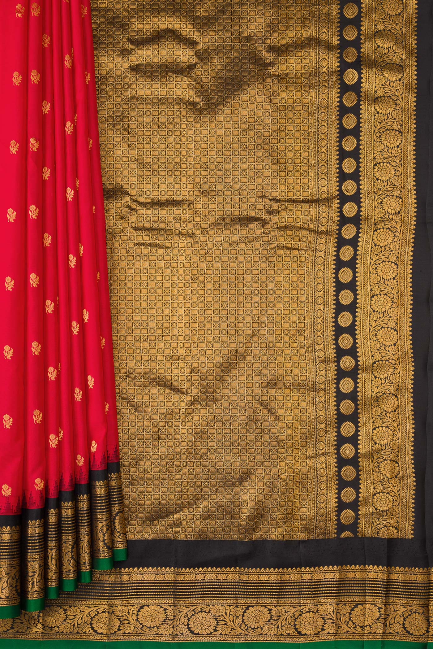 Pleats and pallu of Red Dual Tone Gadwal Silk Saree with Zari Butta on the body and Zari Border. 