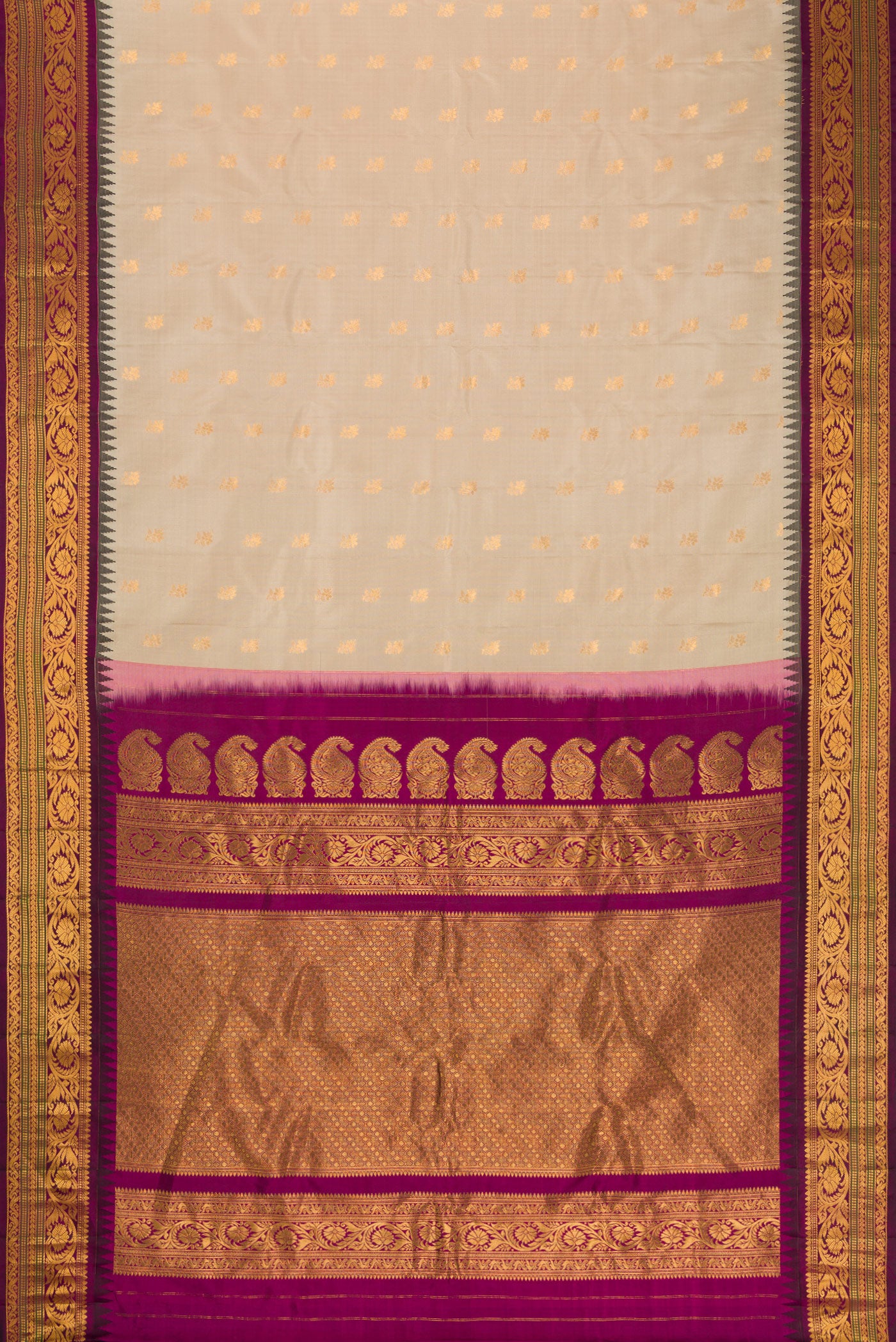 Flat view of Beige Dual Tone Gadwal Silk Saree with Zari Butta on the body and Zari Border. 