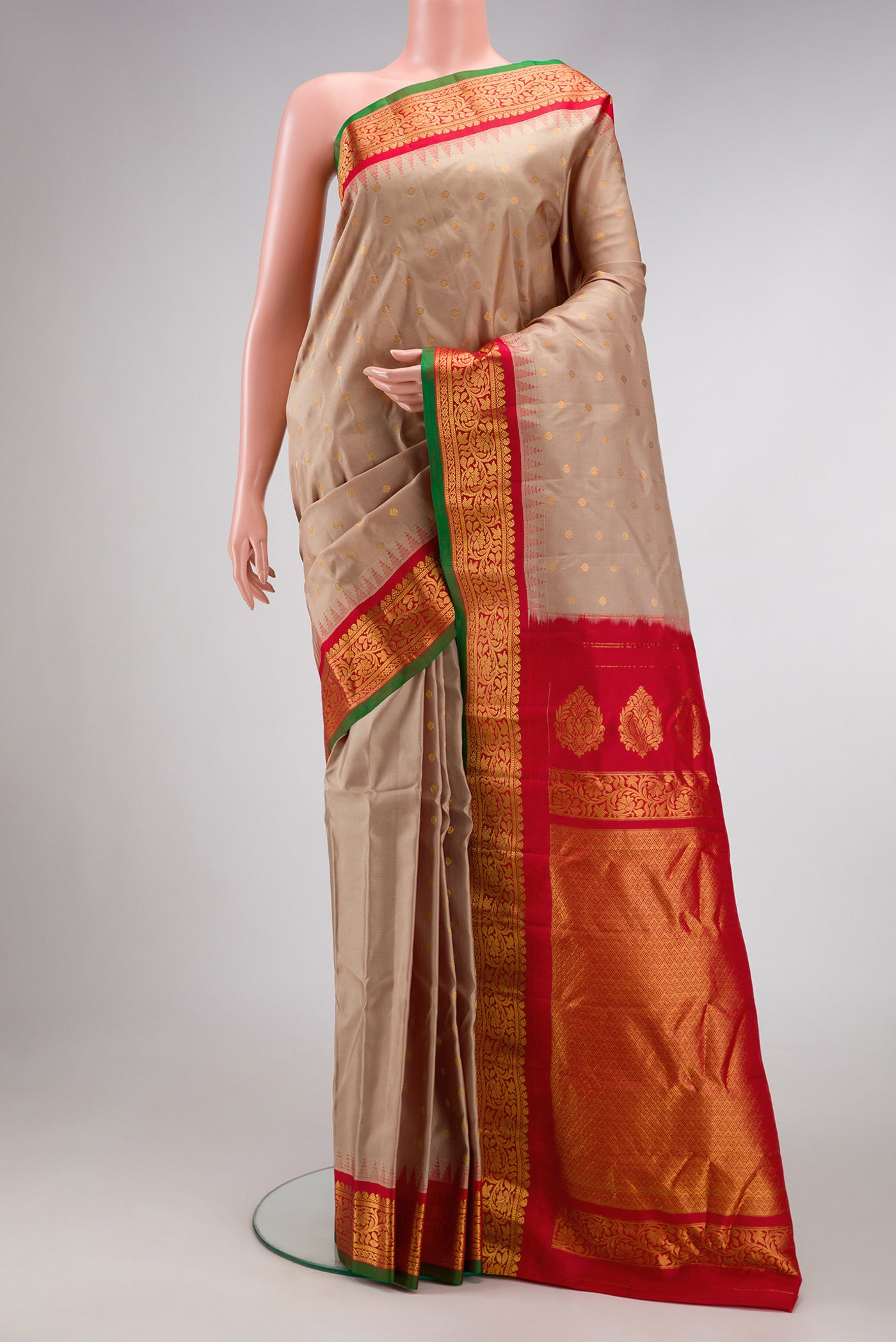 Beige Dual Tone Gadwal Silk Saree with Zari Butta on the body and Zari Border.  displayed on a mannequin