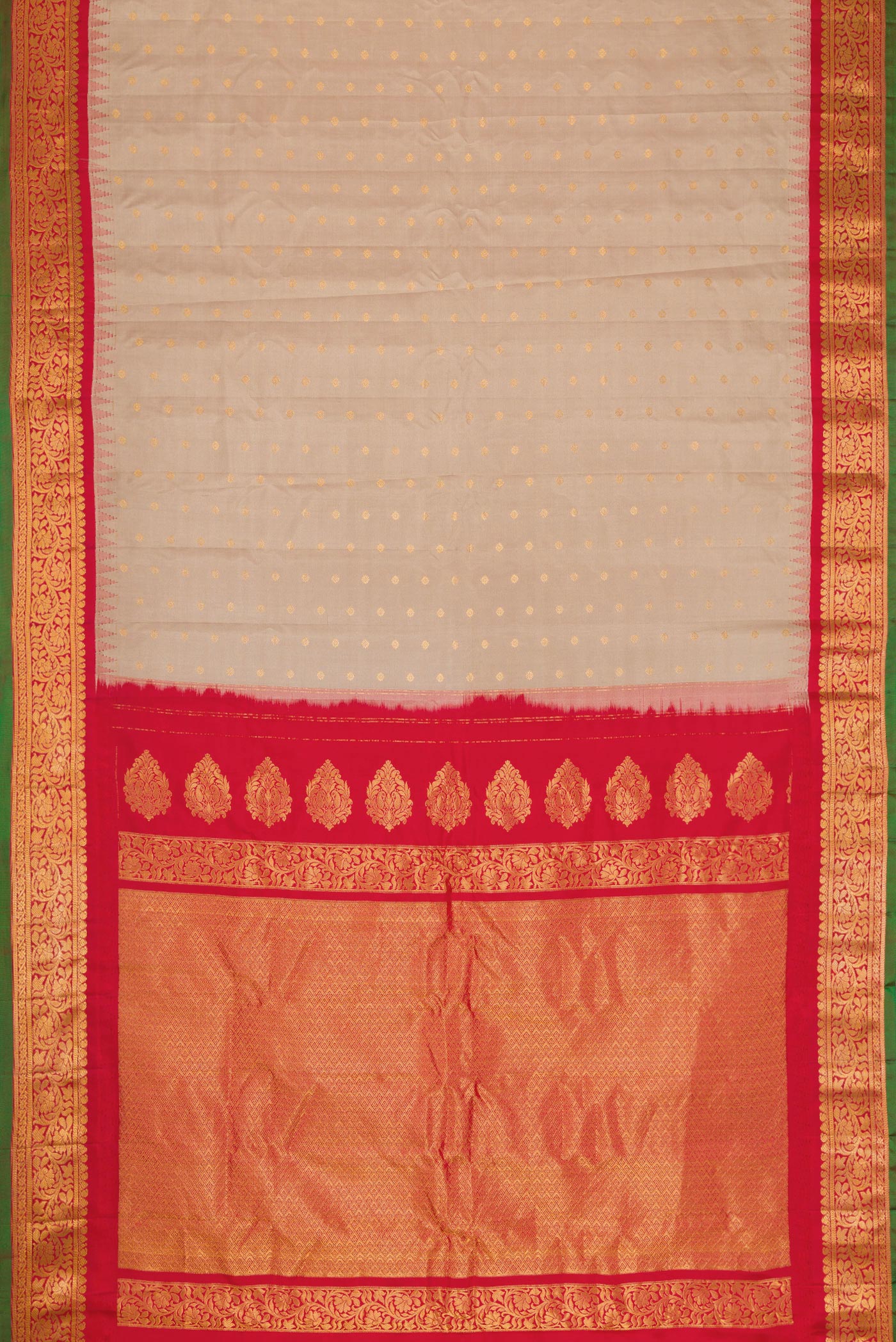 Flat view of Beige Dual Tone Gadwal Silk Saree with Zari Butta on the body and Zari Border. 