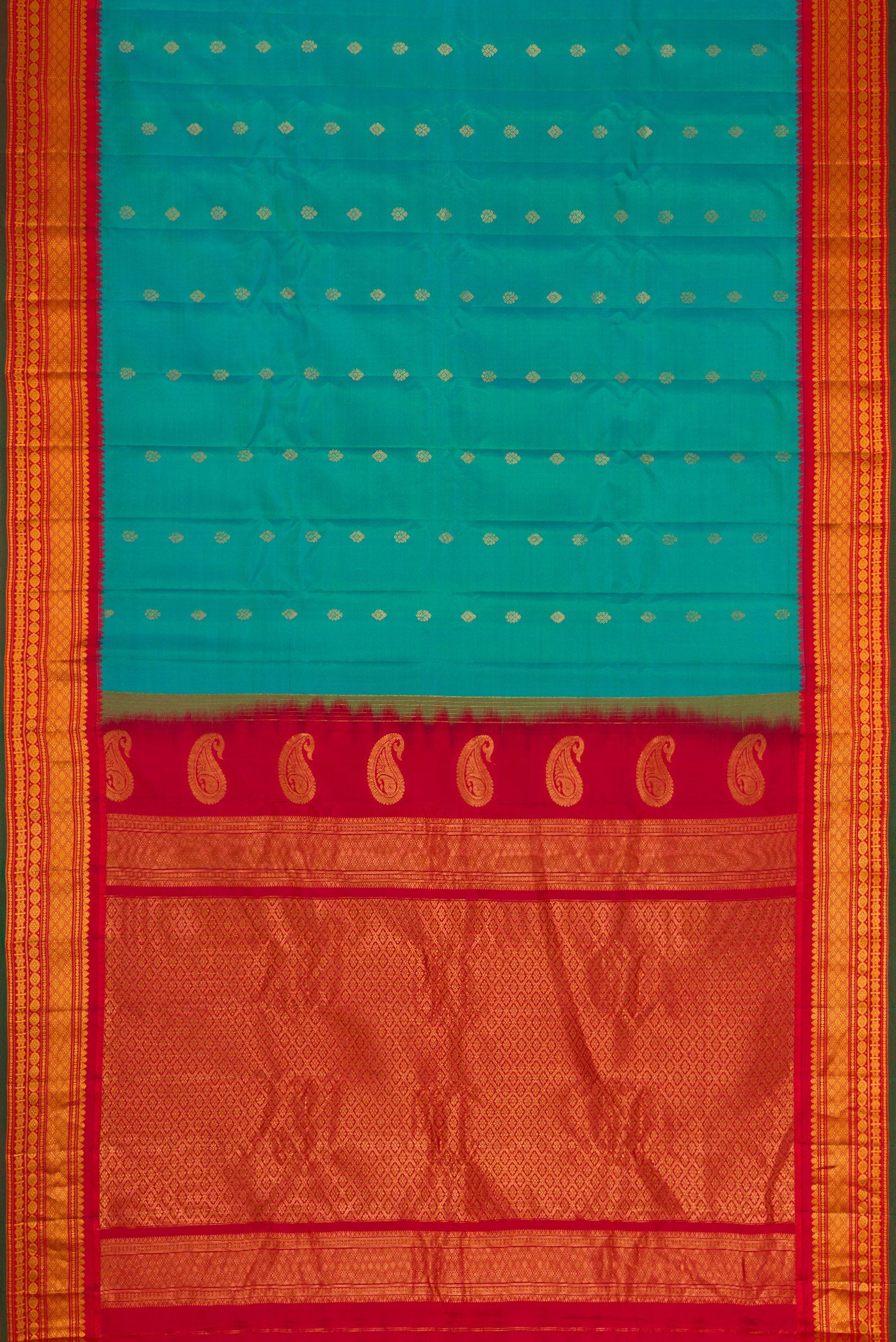 Flat view of Green Dual Tone Gadwal Silk Saree with Zari Butta on the body and Zari Border. 