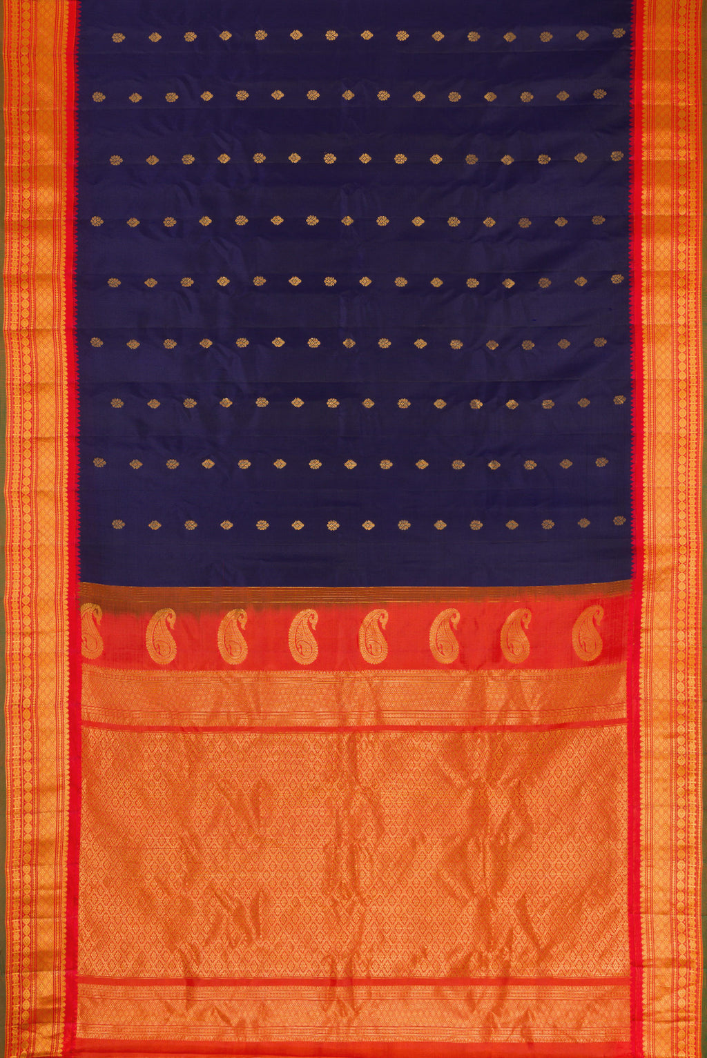 Flat view of Navy Blue Dual Tone Gadwal Silk Saree with Zari Butta on the body and Zari Border. 