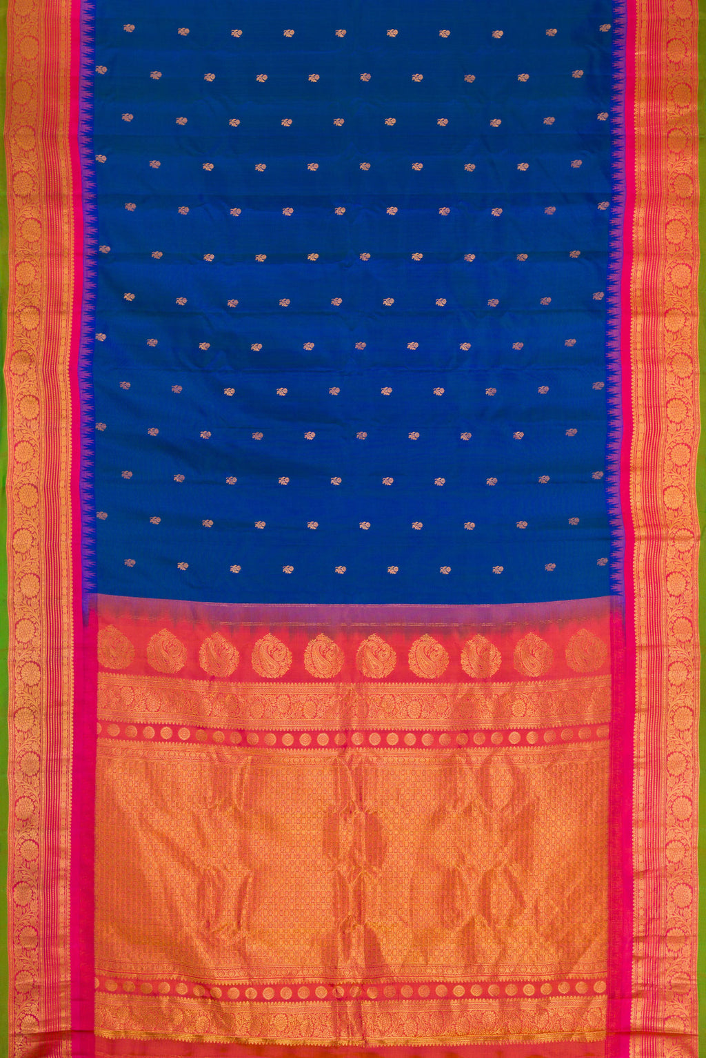 Flat view of Peacock Blue Dual Tone Gadwal Silk Saree with Zari Butta on the body and Temple Border. 