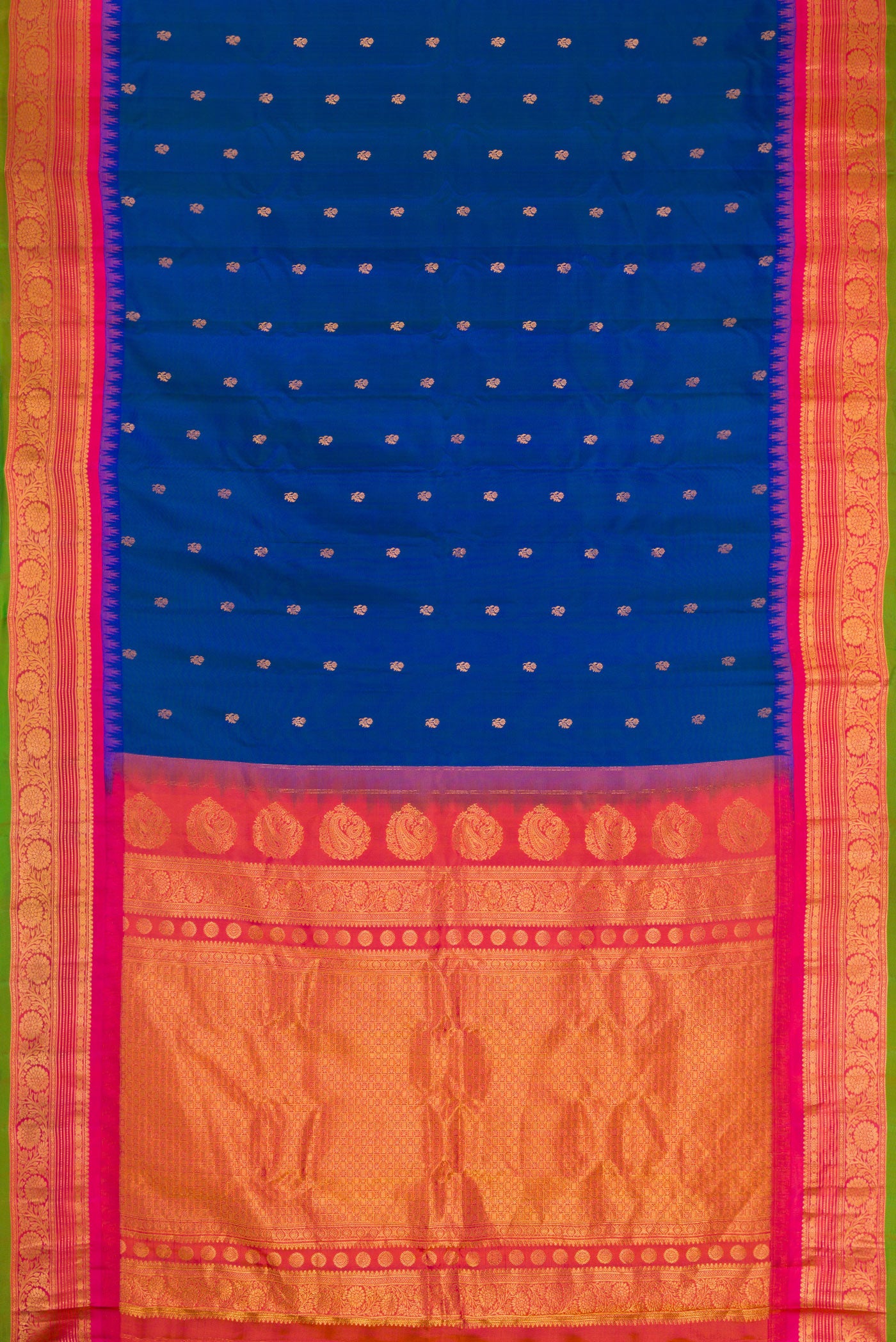 Flat view of Peacock Blue Dual Tone Gadwal Silk Saree with Zari Butta on the body and Temple Border. 