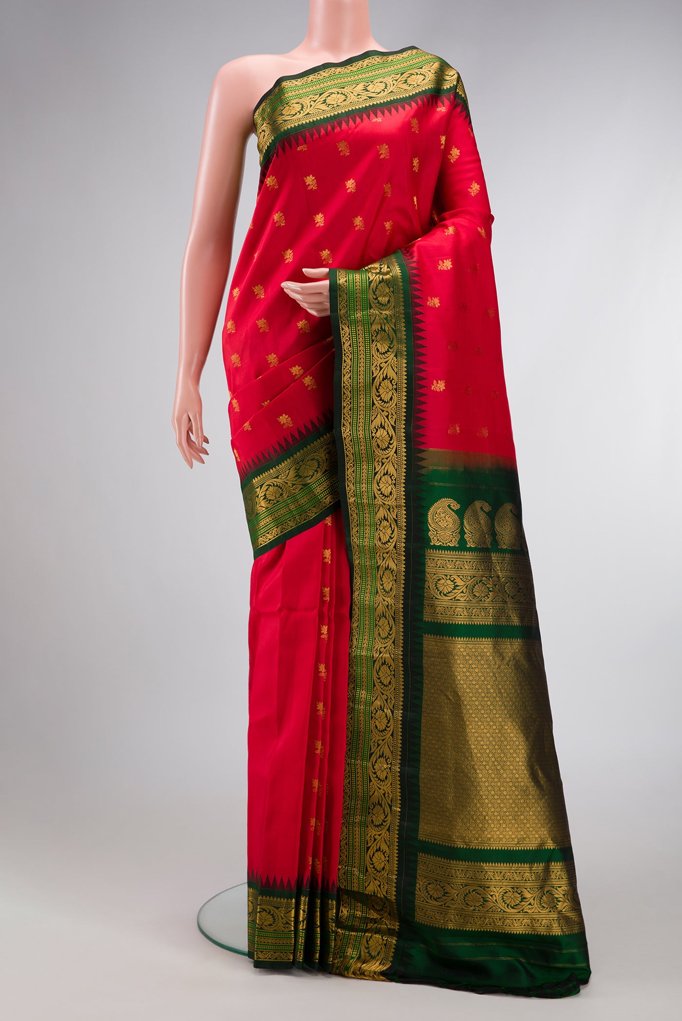 Red Dual Tone Gadwal Silk Saree with Zari Butta on the body and Zari Border.  displayed on a mannequin