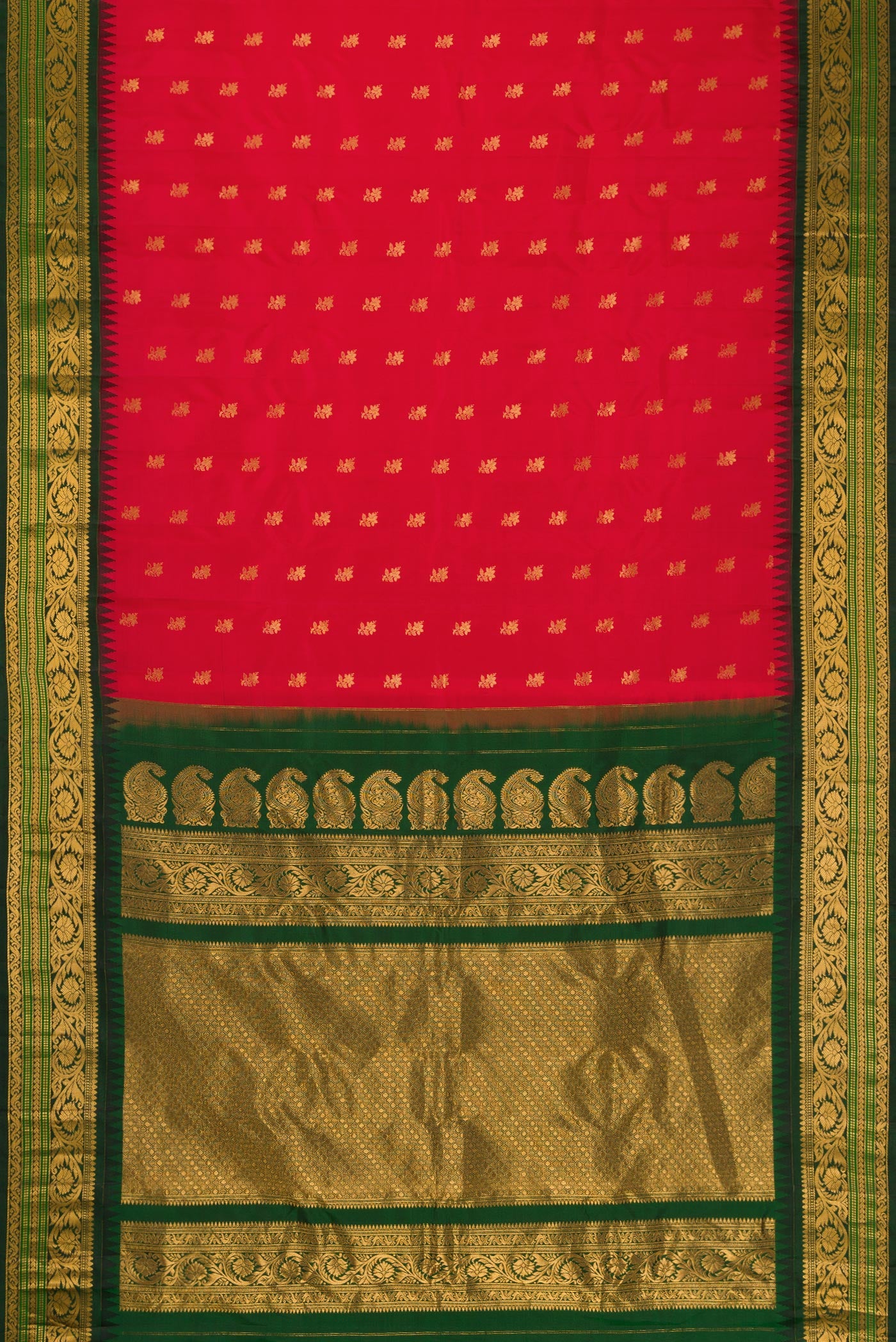 Flat view of Red Dual Tone Gadwal Silk Saree with Zari Butta on the body and Zari Border. 