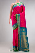 Dark Pink Dual Tone Gadwal Silk Saree with Zari Butta on the body and Zari Border.  displayed on a mannequin