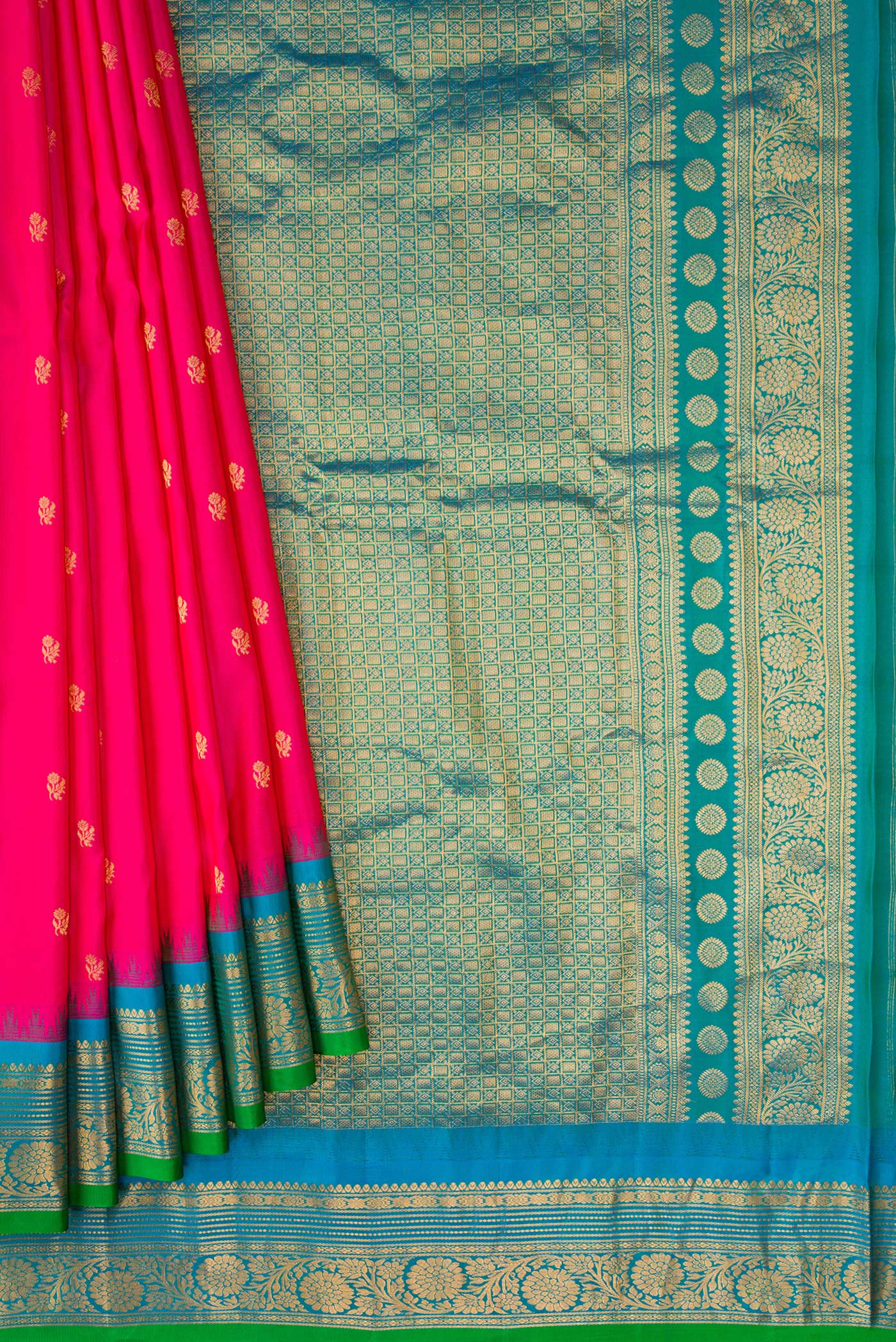 Pleats and pallu of Dark Pink Dual Tone Gadwal Silk Saree with Zari Butta on the body and Zari Border. 