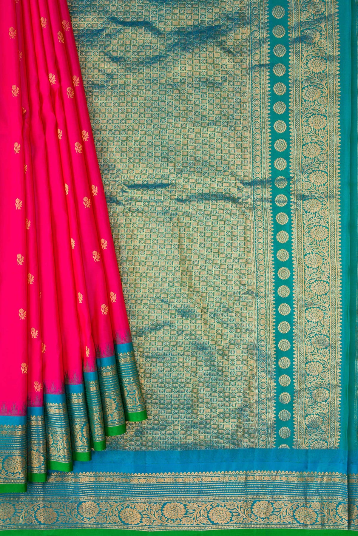 Pleats and pallu of Dark Pink Dual Tone Gadwal Silk Saree with Zari Butta on the body and Zari Border. 