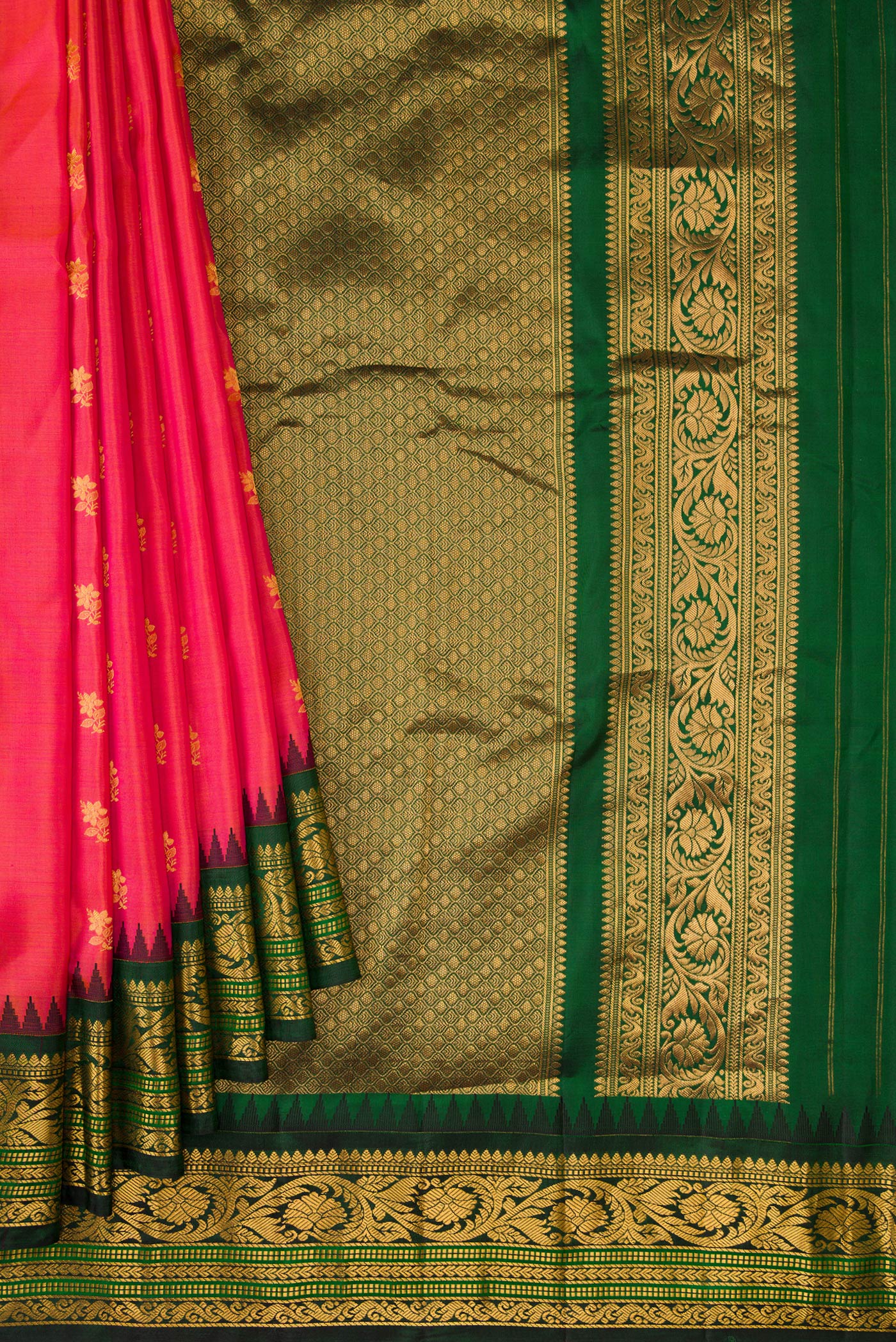 Pleats and pallu of Coral Dual Tone Gadwal Silk Saree with Zari Butta on the body and Zari Border. 