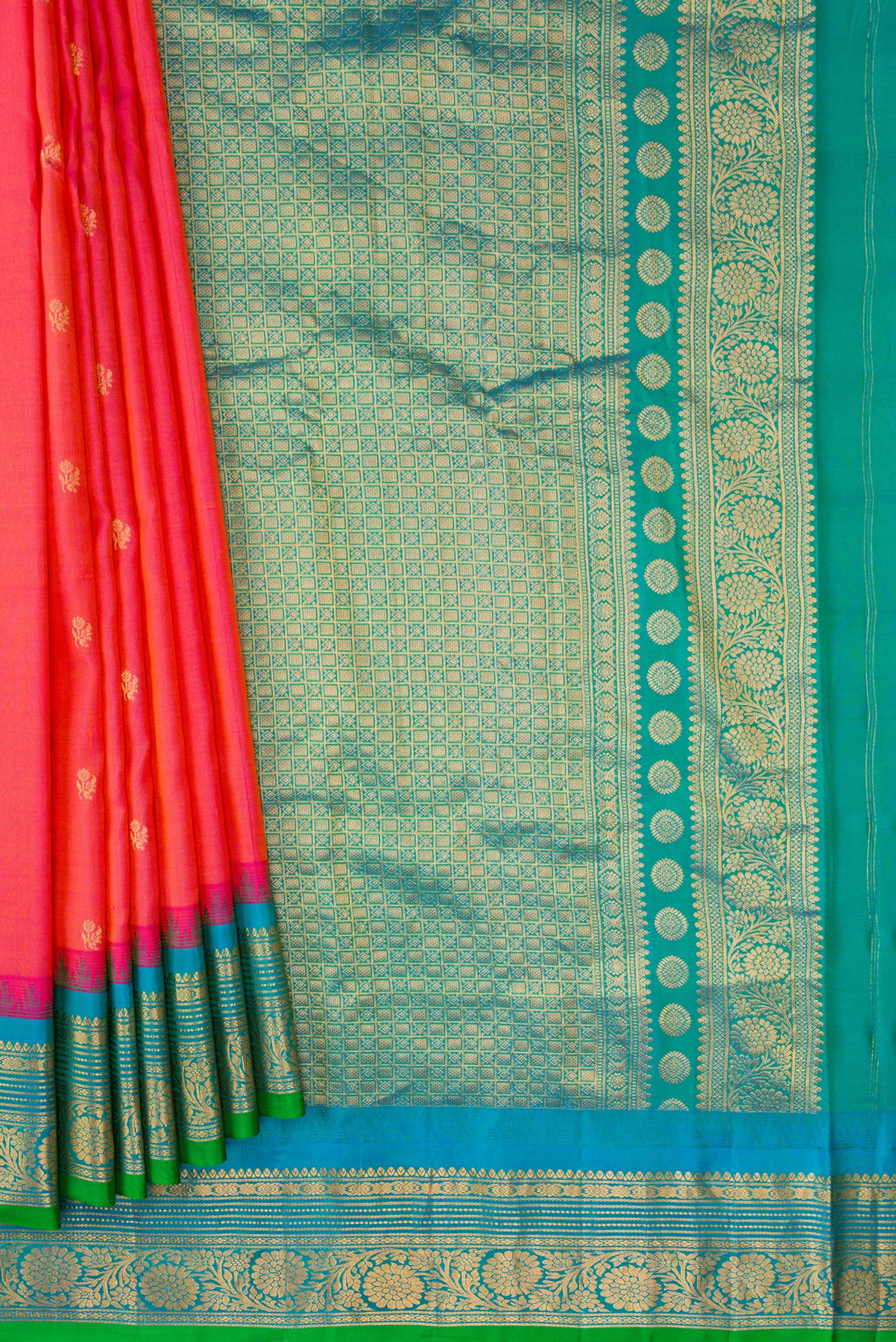 Pleats and pallu of Coral Dual Tone Gadwal Silk Saree with Zari Butta on the body and Zari Border. 