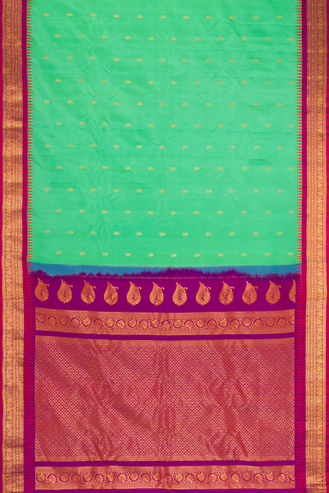 Flat view of Sea Green Dual Tone Gadwal Silk Saree with Zari Butta on the body and Zari Border. 
