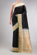 Black Dual Tone Gadwal Silk Saree with Zari Butta on the body and Zari Border.  displayed on a mannequin
