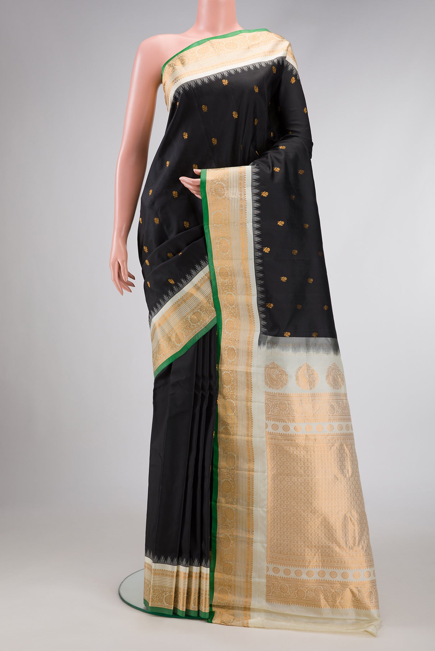 Black Dual Tone Gadwal Silk Saree with Zari Butta on the body and Zari Border.  displayed on a mannequin