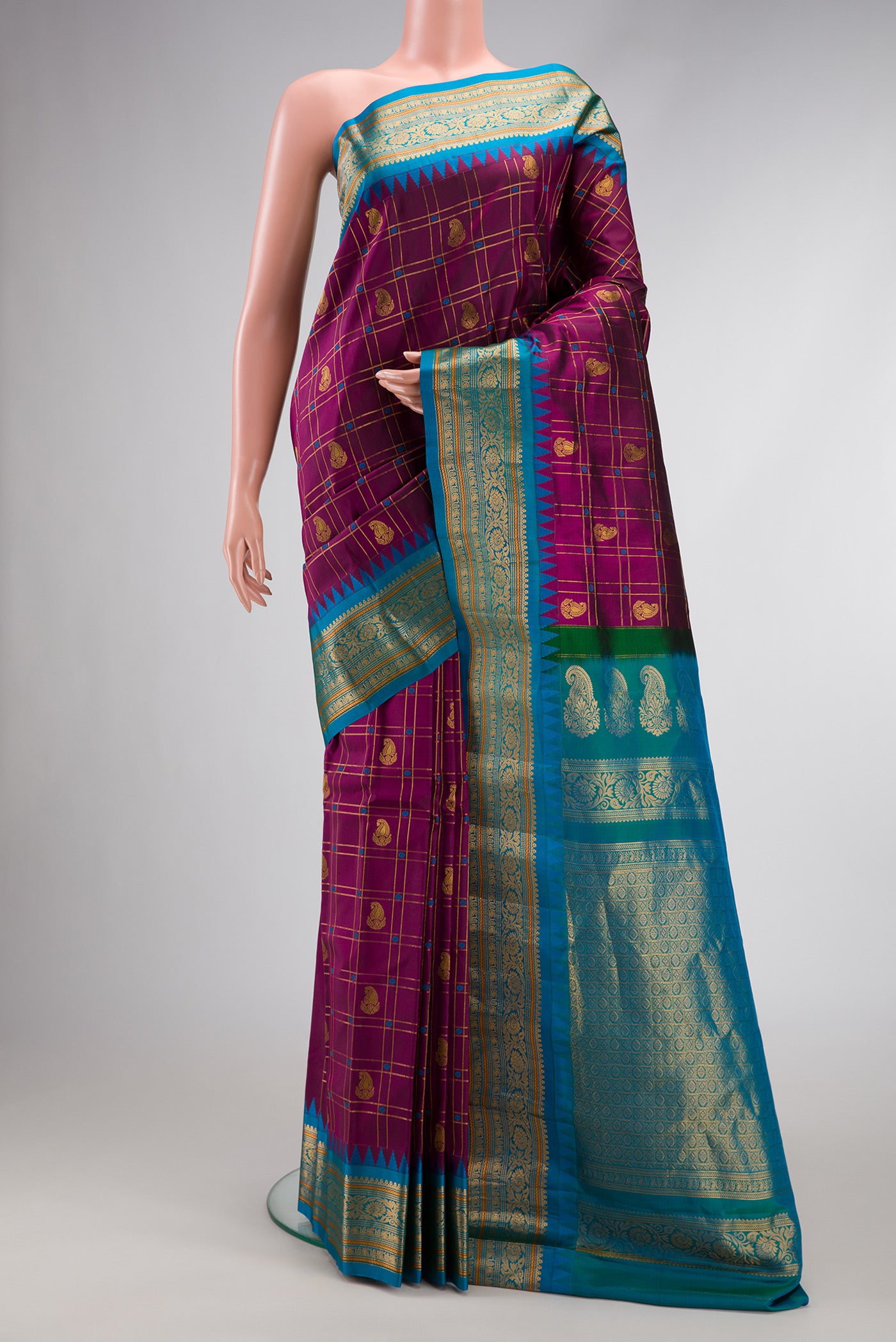Burgundy Dual Tone Gadwal Silk Saree with Checked design on the body and Zari Border.  displayed on a mannequin