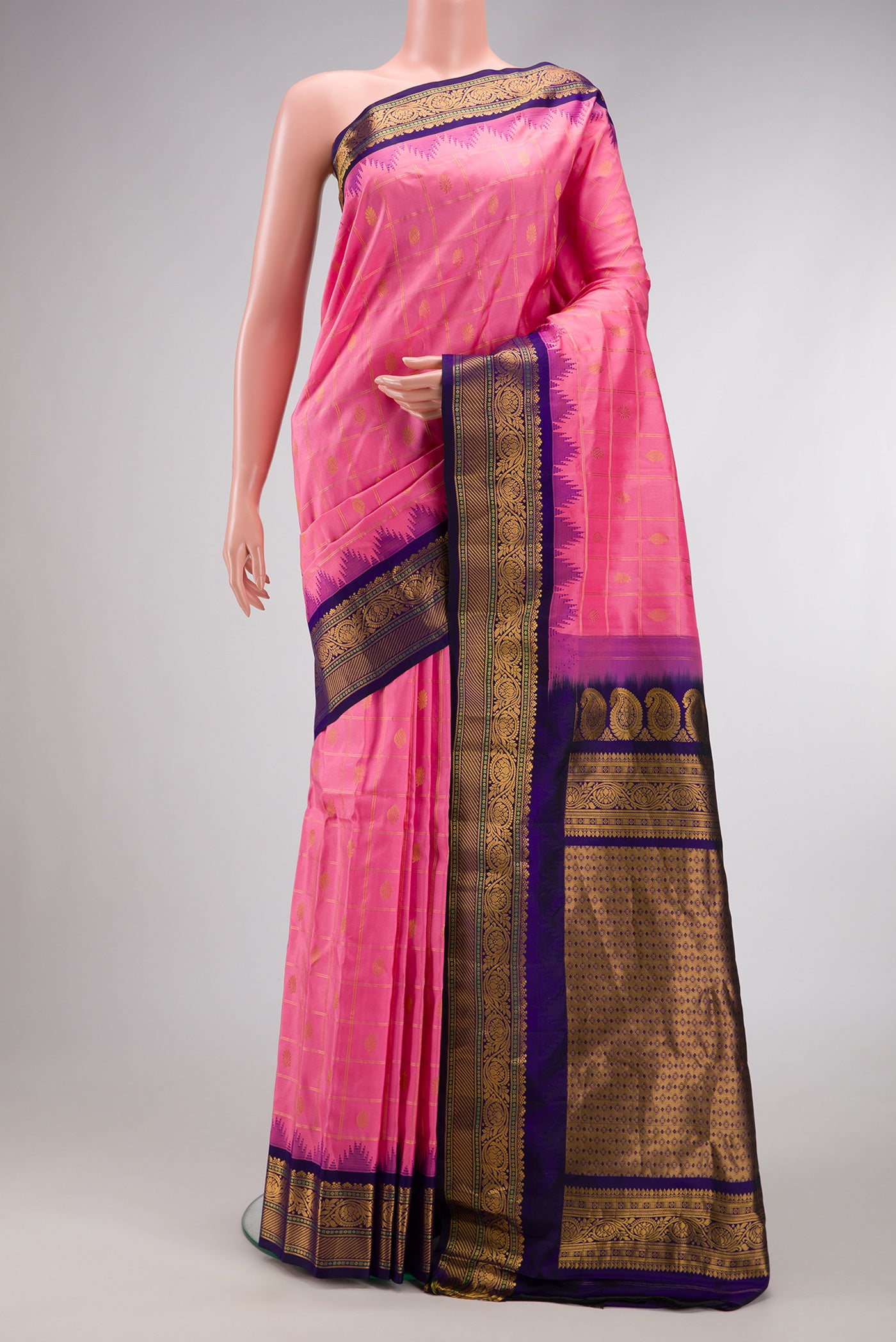 Pink Dual Tone Gadwal Silk Saree with Checked design on the body and Zari Border.  displayed on a mannequin