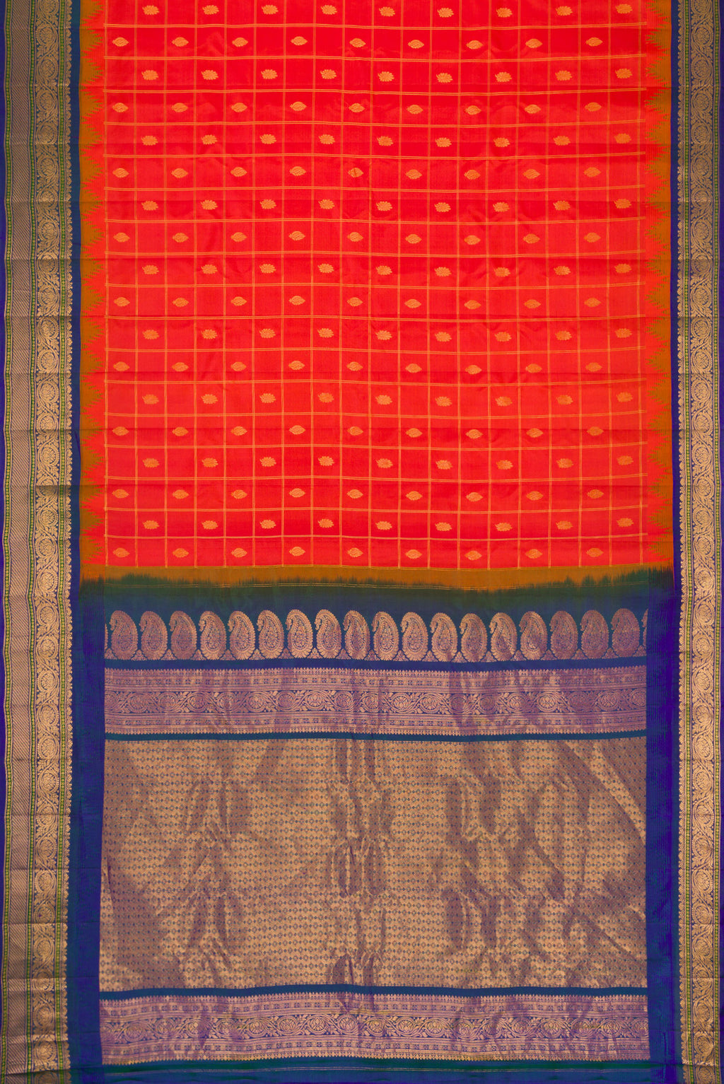 Flat view of Brick Orange Dual Tone Gadwal Silk Saree with Zari Butta on the body and Zari Border. 