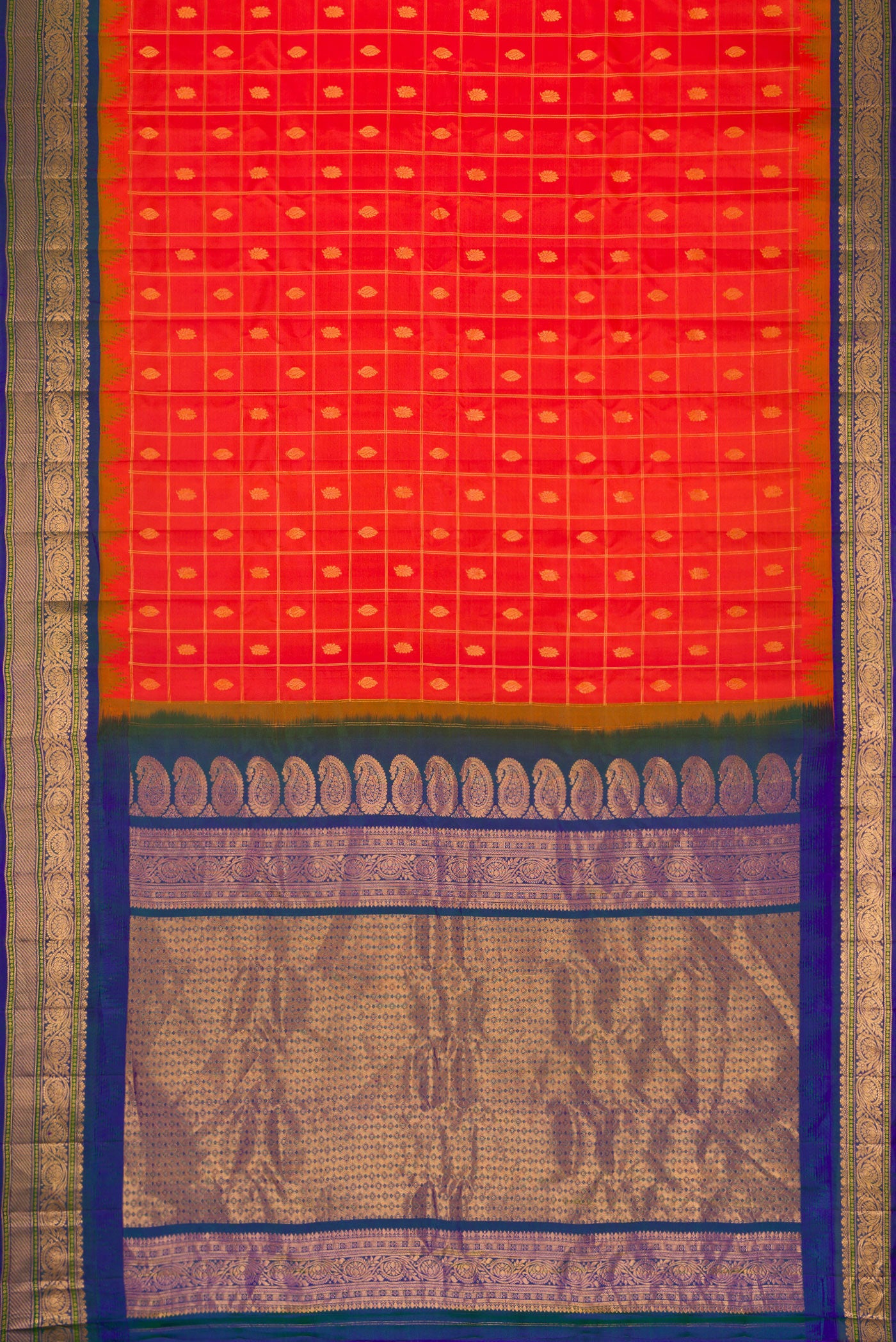 Flat view of Brick Orange Dual Tone Gadwal Silk Saree with Zari Butta on the body and Zari Border. 
