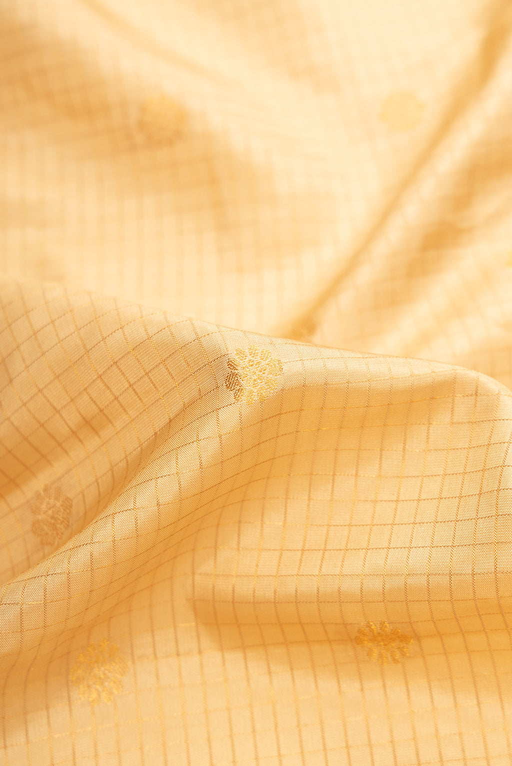 Close up of Sandal Dual Tone Gadwal Silk Saree with Zari Butta on the body and Zari Border.  displaying folds