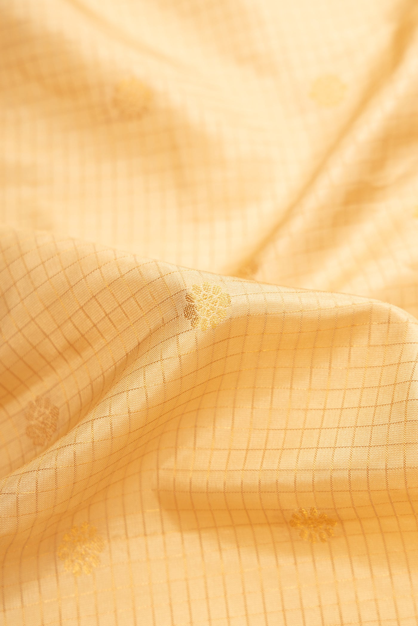 Close up of Sandal Dual Tone Gadwal Silk Saree with Zari Butta on the body and Zari Border.  displaying folds