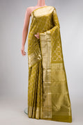 Mehandi Green Dual Tone Kanchipuram Silk Saree with Zari Brocade on the body and Zari Border.  displayed on a mannequin