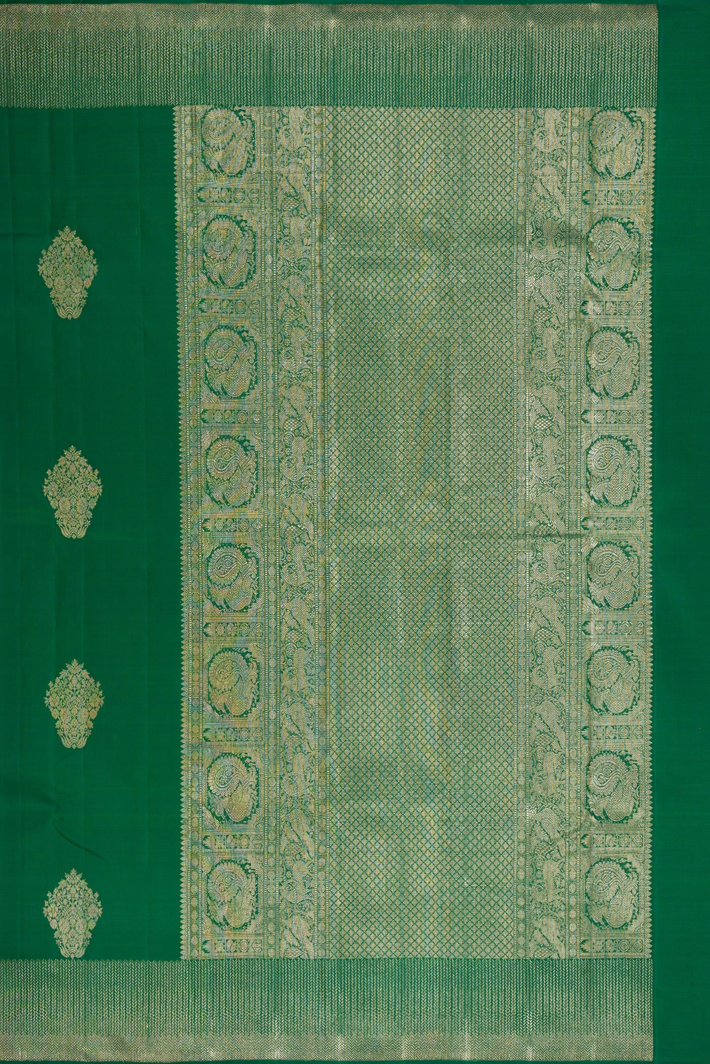 Close up image of the pallu of Bottle Green Dual Tone Kanjivaram Silk Saree with Zari Butta on the body and Zari Border. 