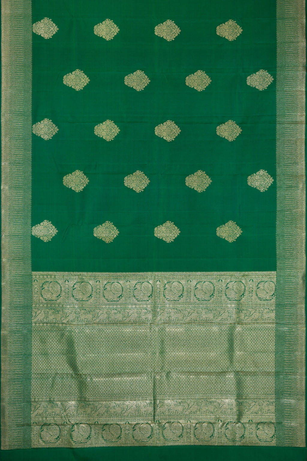 Flat view of Bottle Green Dual Tone Kanjivaram Silk Saree with Zari Butta on the body and Zari Border. 