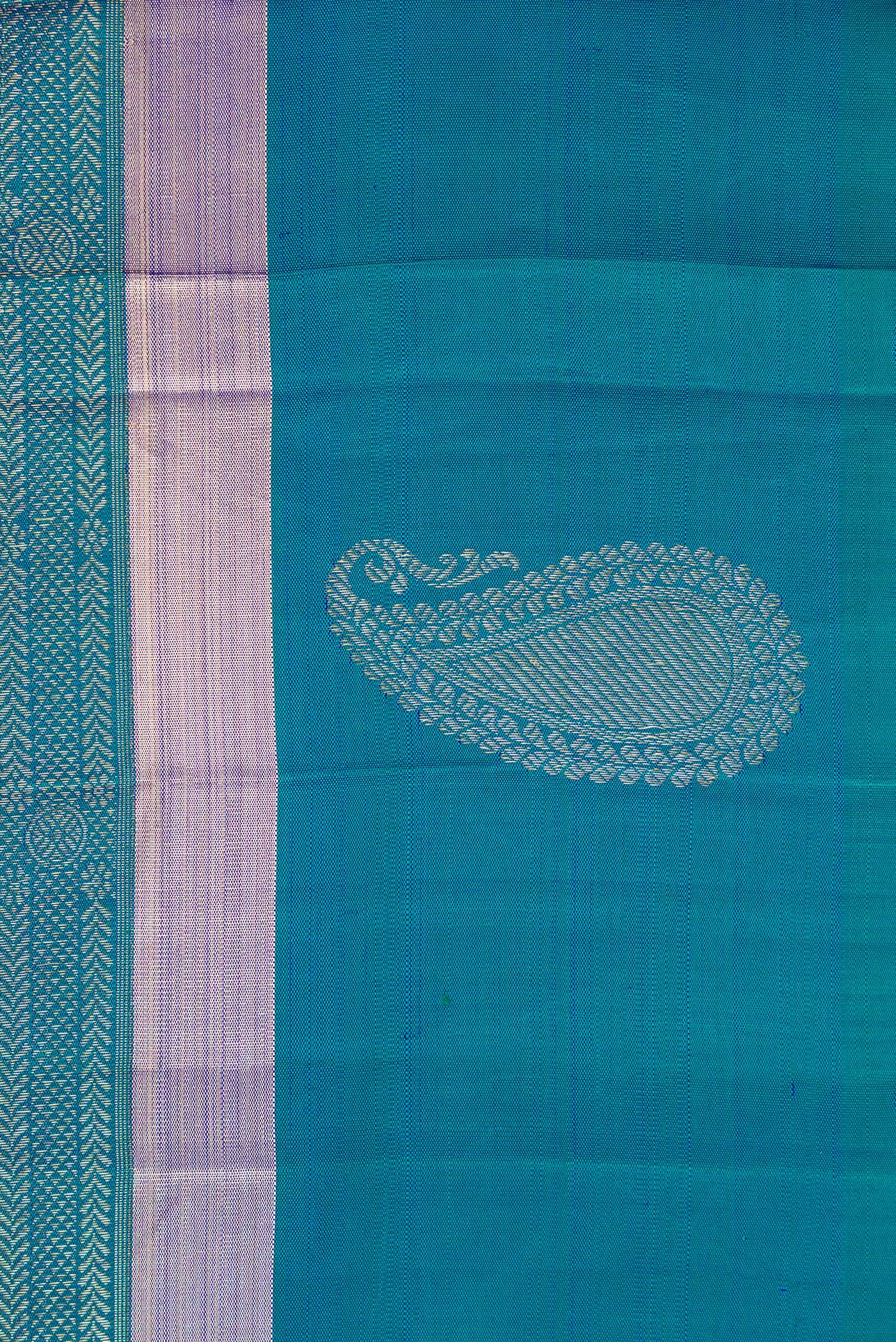 Border image of Peacock Blue Dual Tone Kanchipuram Silk Saree with Zari Brocade on the body and Zari Border. 