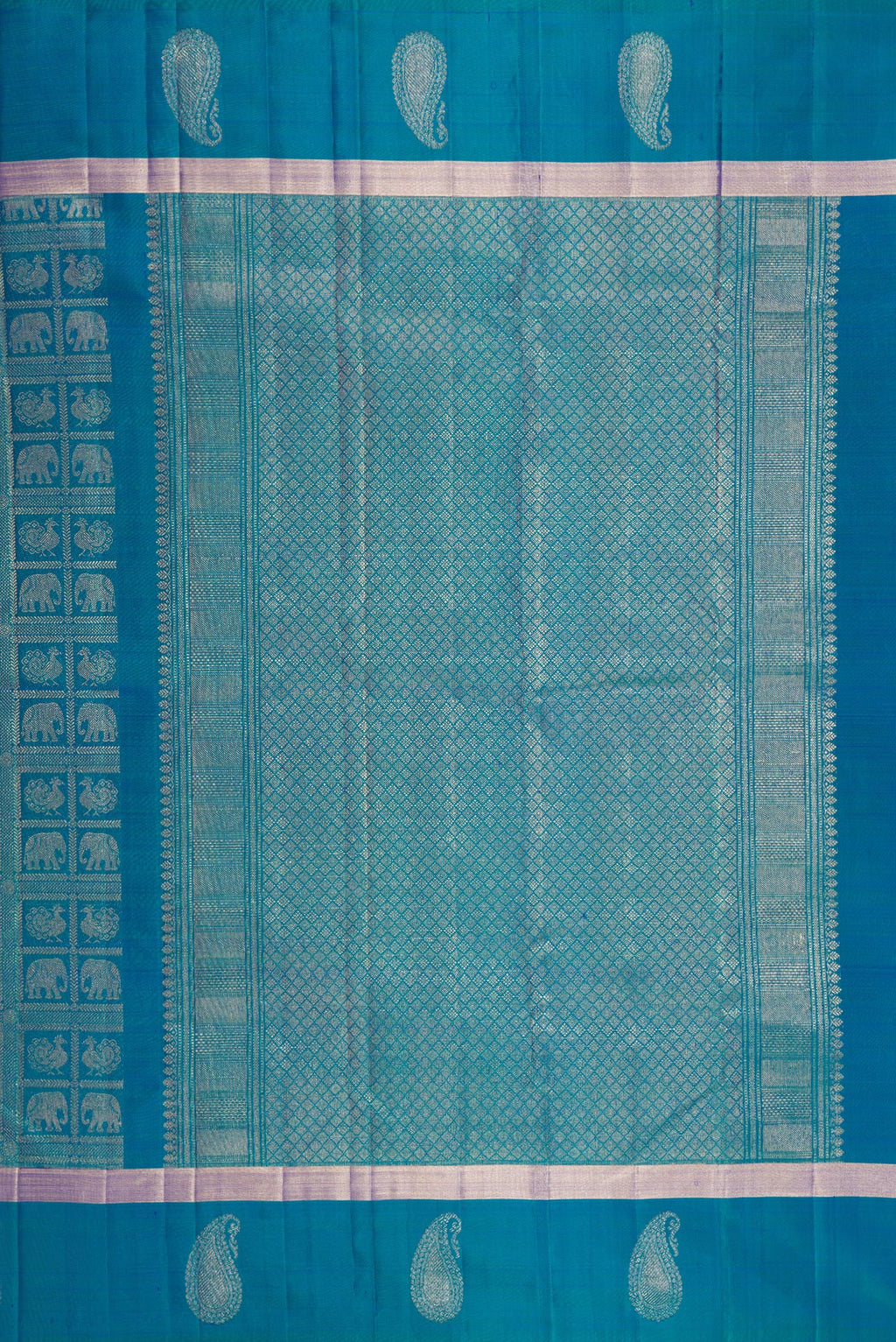 Close up image of the pallu of Peacock Blue Dual Tone Kanchipuram Silk Saree with Zari Brocade on the body and Zari Border. 