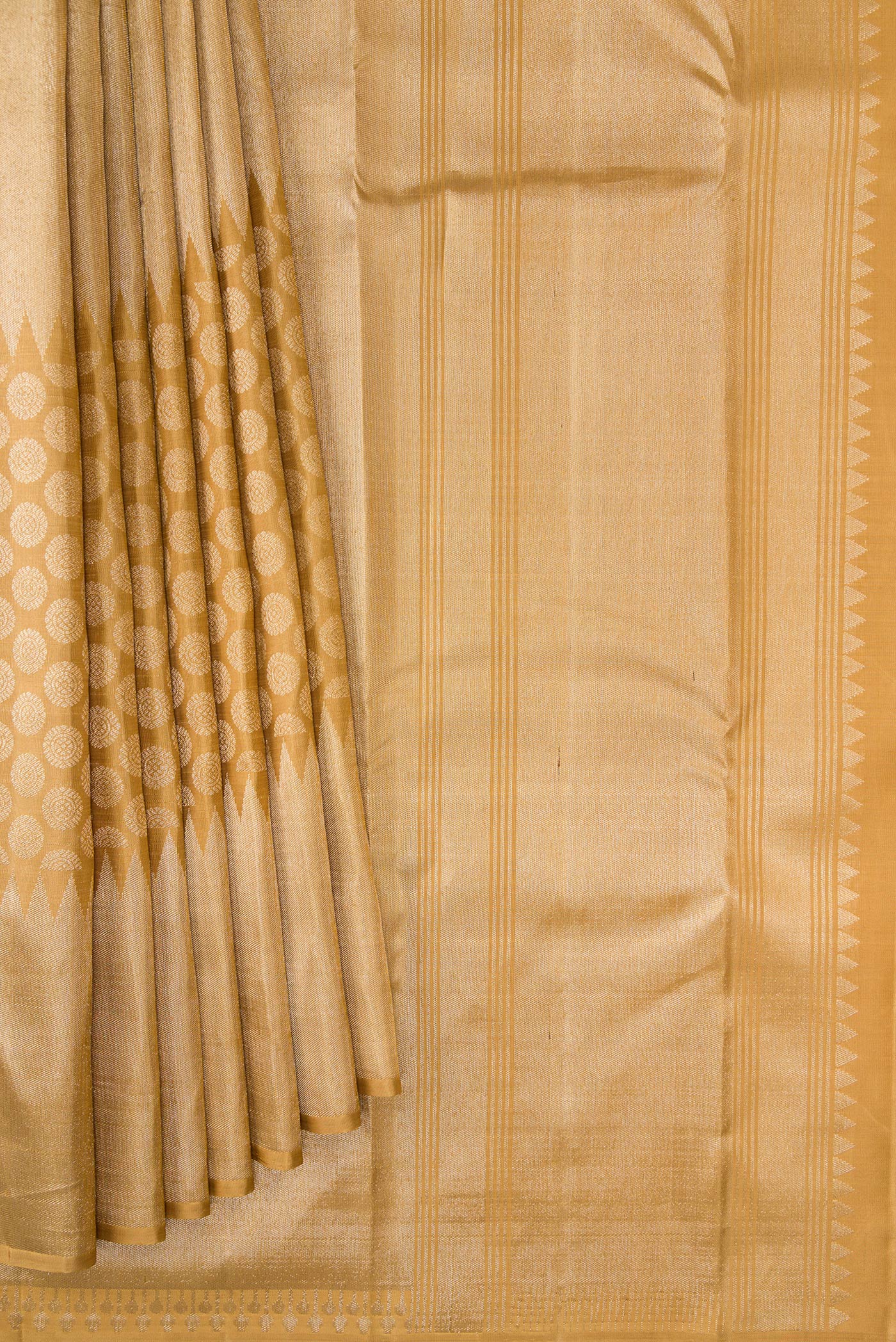 Pleats and pallu of Gold Dual Tone Kanchipuram Silk Saree with Zari Brocade on the body and Temple Border. 