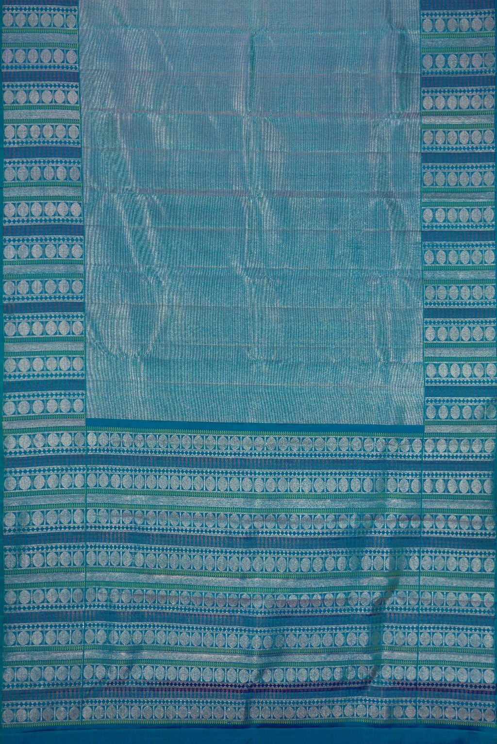 Flat view of Peacock Blue Dual Tone Kanchipuram Silk Saree with Zari Brocade on the body and Fancy Border. 