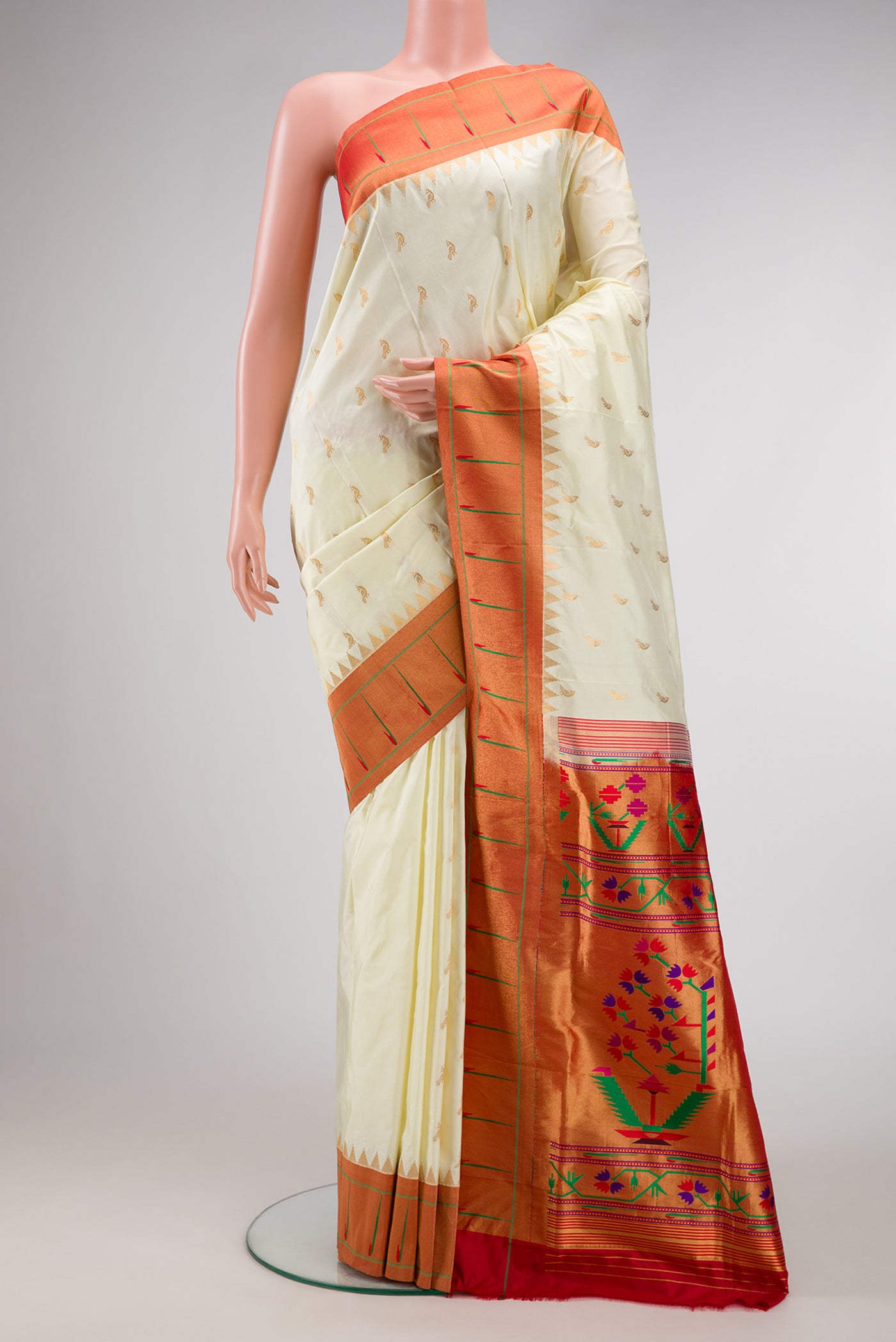 Off White Dual Tone Paithani Silk Saree with Zari Butta on the body and Paithani Border.  displayed on a mannequin