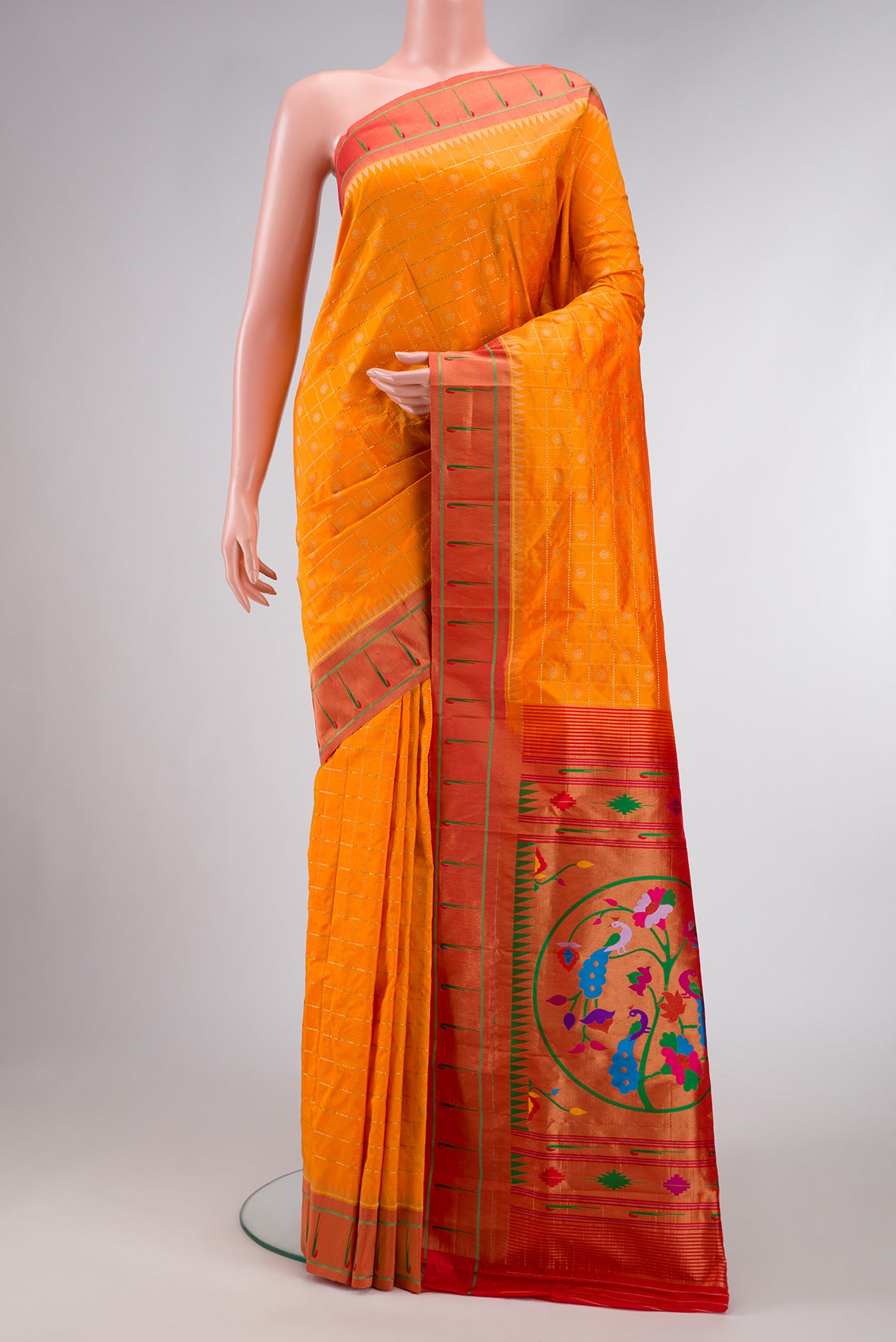 Orange Dual Tone Paithani Silk Saree with Zari Butta on the body and Paithani Border.  displayed on a mannequin