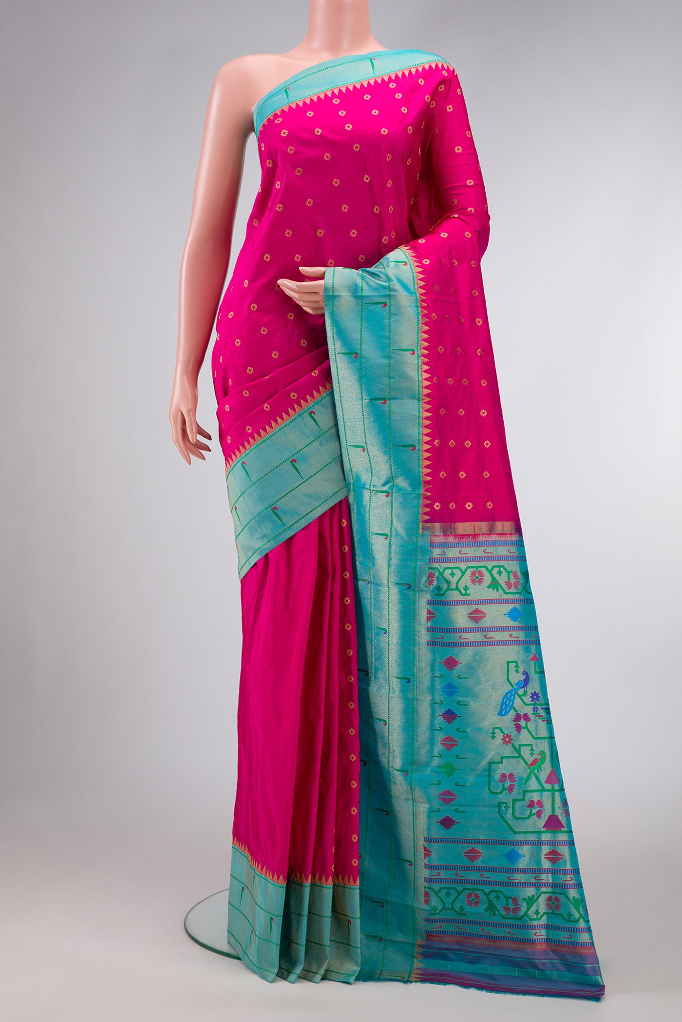 Pink Dual Tone Paithani Silk Saree with Zari Butta on the body and Paithani Border.  displayed on a mannequin