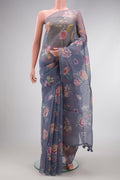 Grey Dual Tone Organza Silk Saree with Printed design on the body and Without Border.  displayed on a mannequin