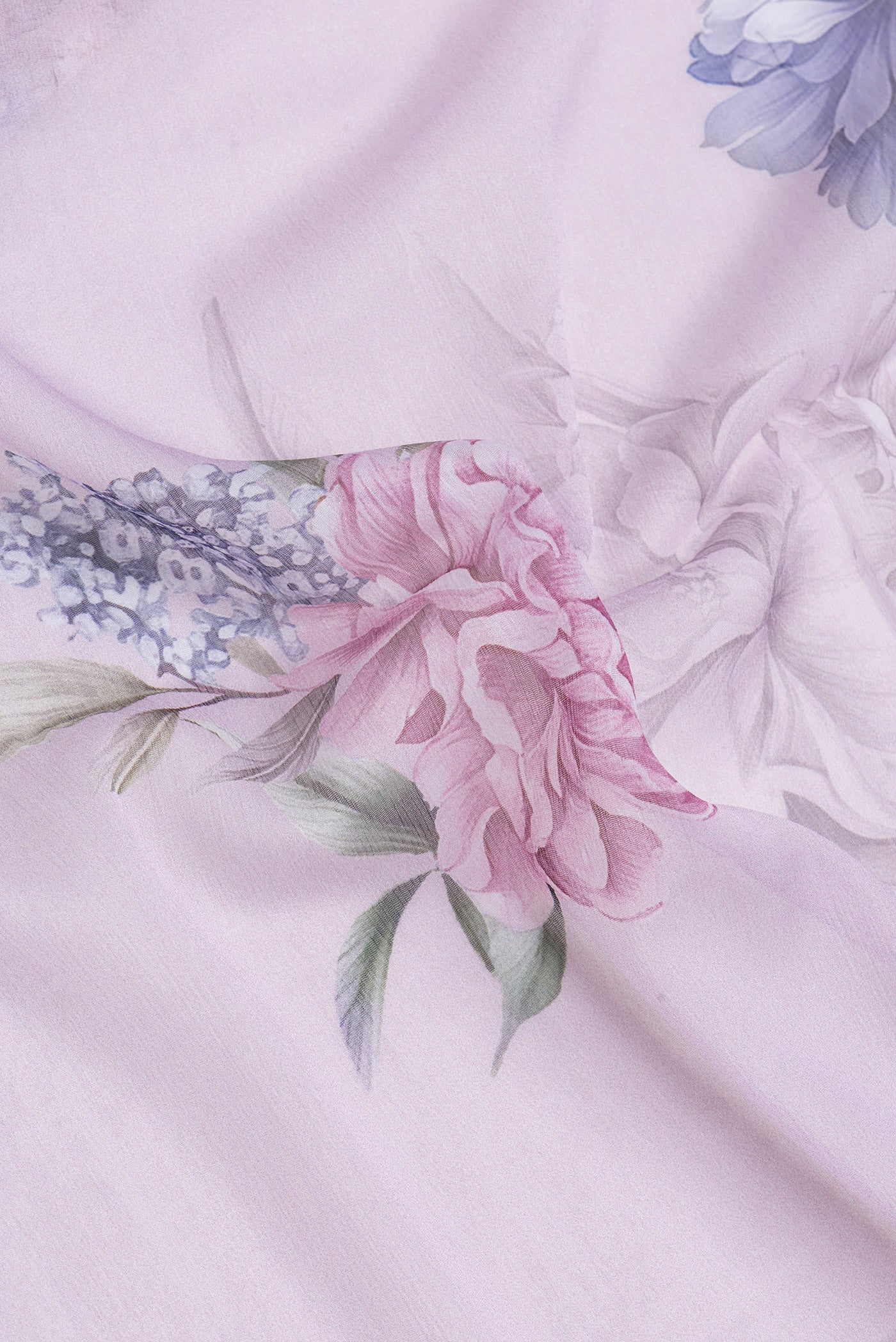 Close up of Lavender Dual Tone Mysore Chiffon Saree with Printed design on the body and Without Border.  displaying folds