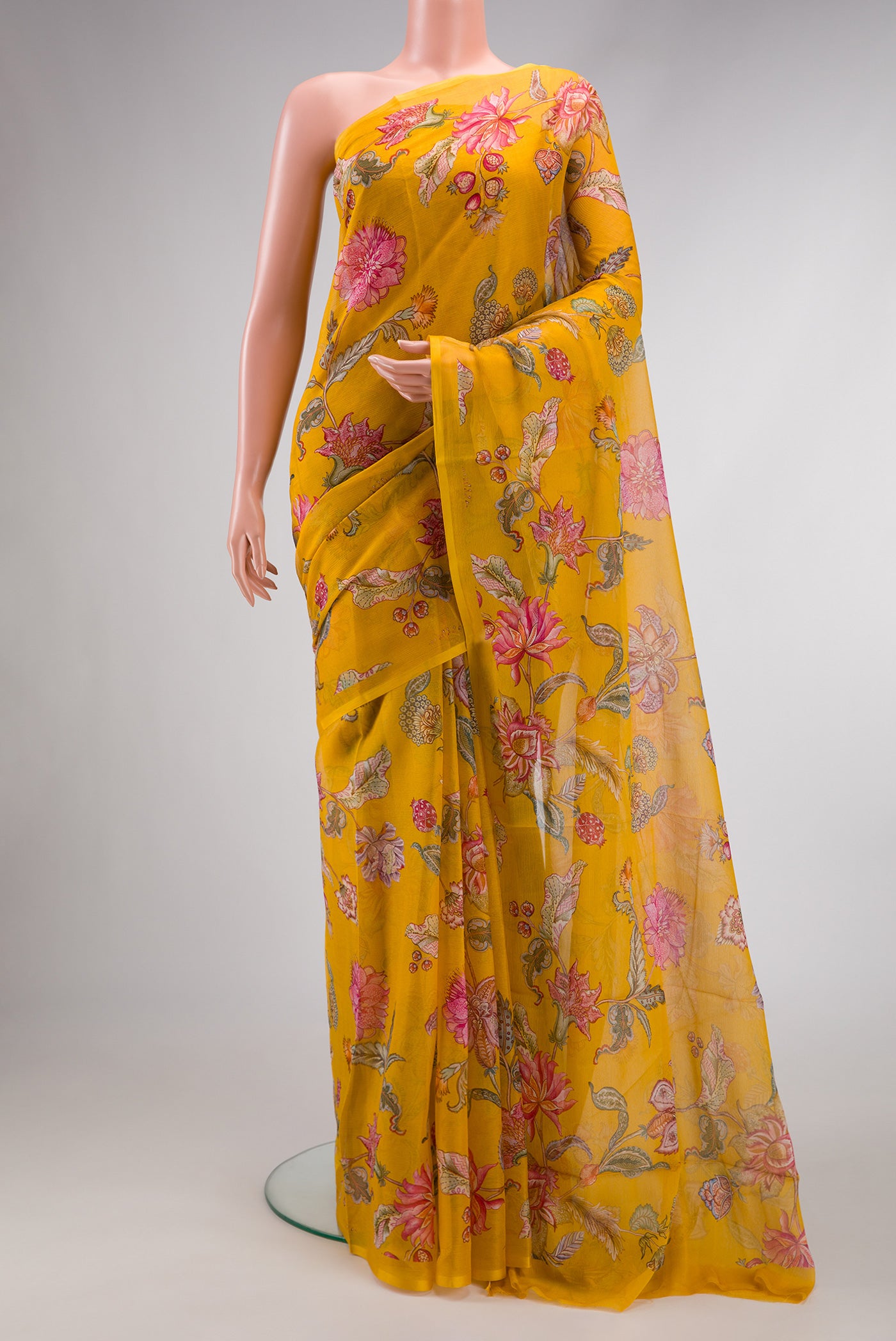 Mustard Dual Tone Mysore Chiffon Saree with Printed design on the body and Without Border.  displayed on a mannequin