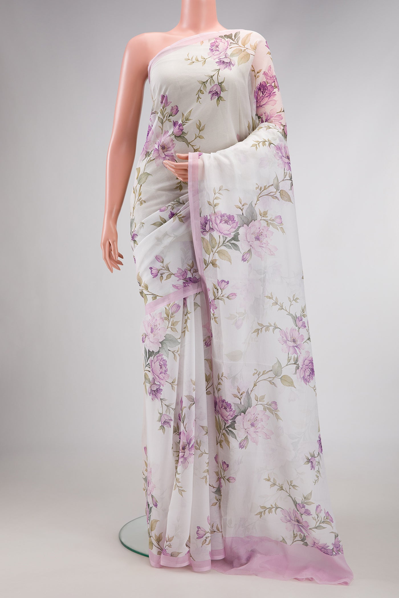 Off White Dual Tone Mysore Chiffon Saree with Printed design on the body and Plain Border.  displayed on a mannequin