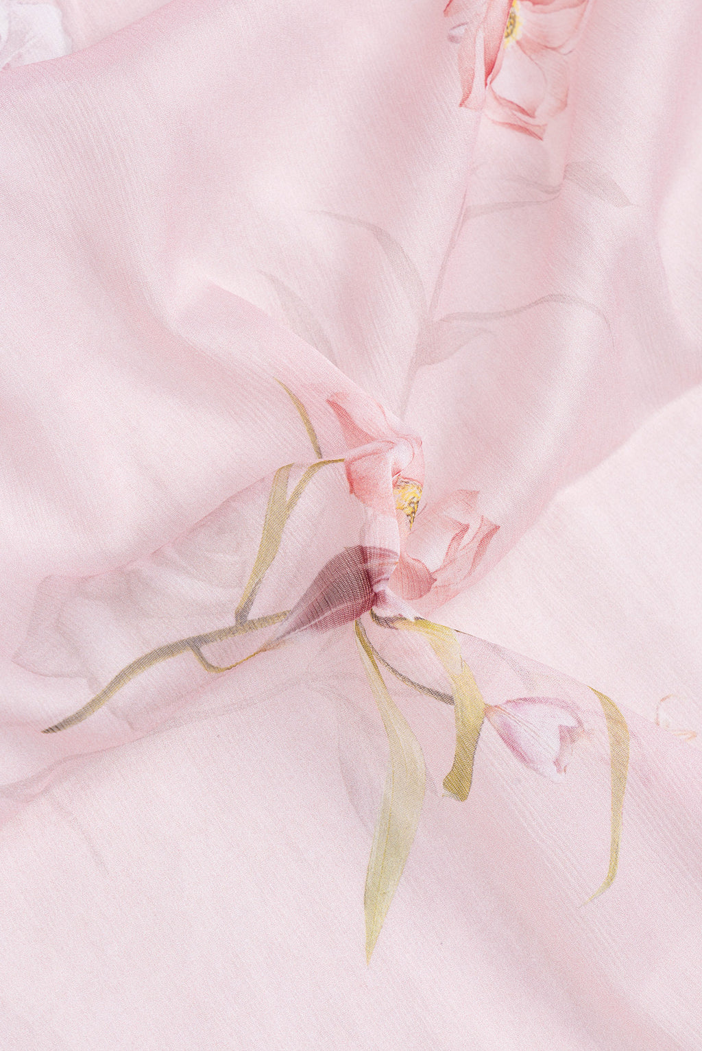 Close up of Rose pink Mysore Chiffon Saree with Printed design on the body and Plain Border.  displaying folds