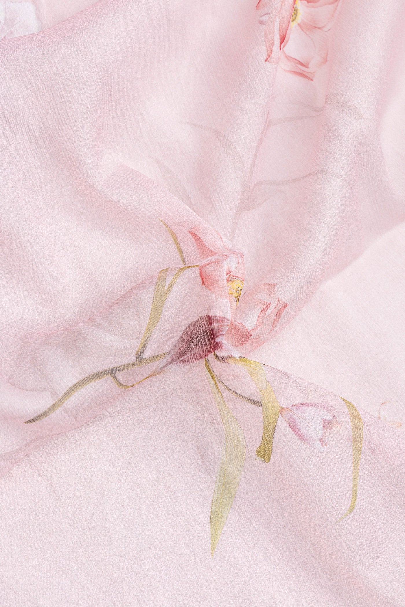 Close up of Rose pink Mysore Chiffon Saree with Printed design on the body and Plain Border.  displaying folds