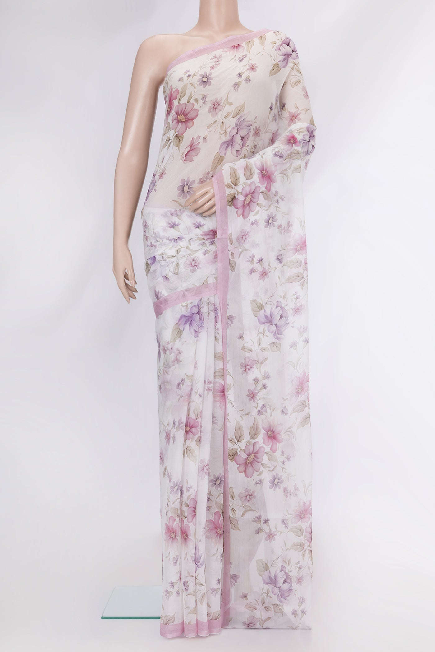 White Dual Tone Mysore Chiffon Saree with Printed design on the body and Plain Border.  displayed on a mannequin
