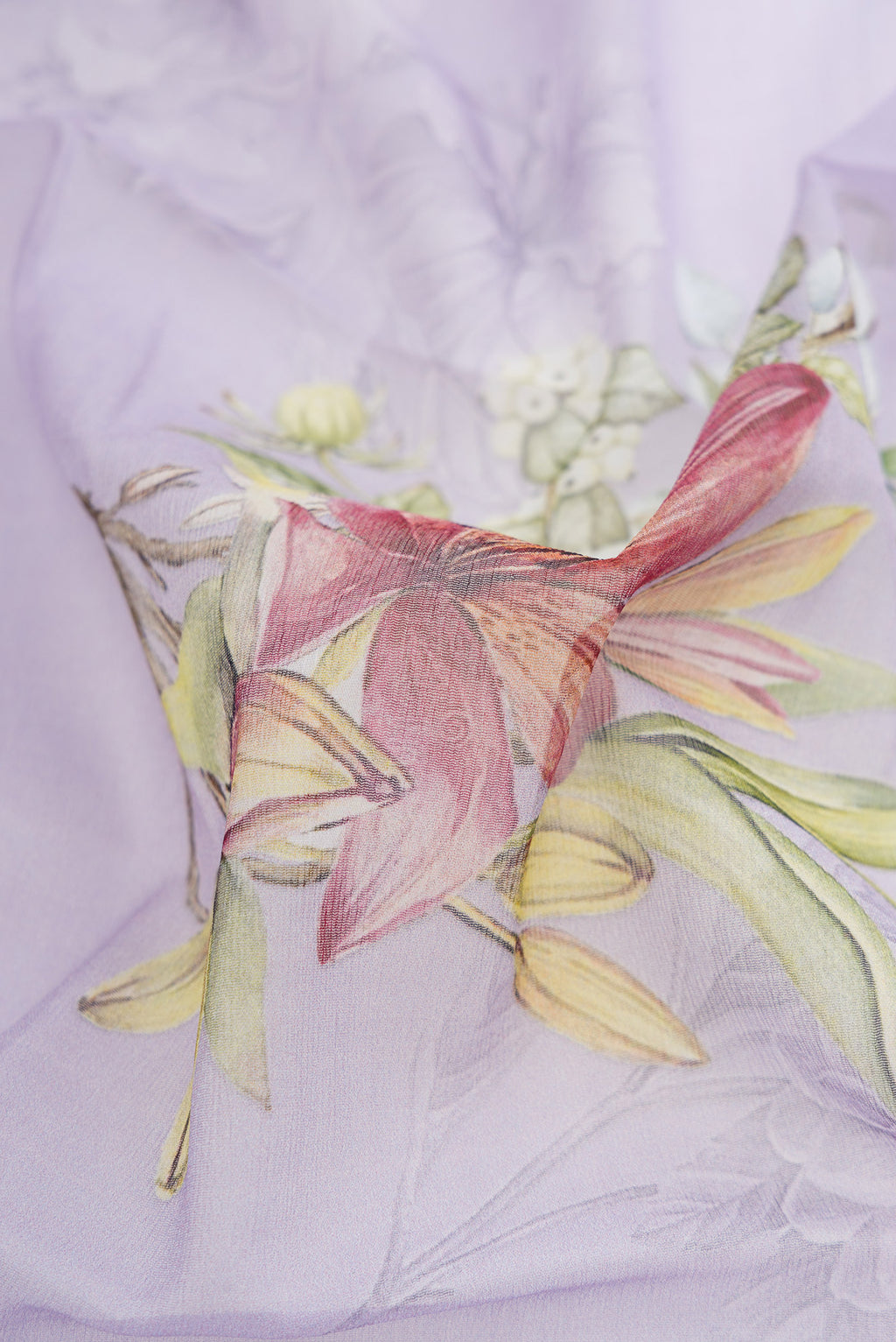 Close up of Lilac Dual Tone Mysore Chiffon Saree with Printed design on the body and Without Border.  displaying folds