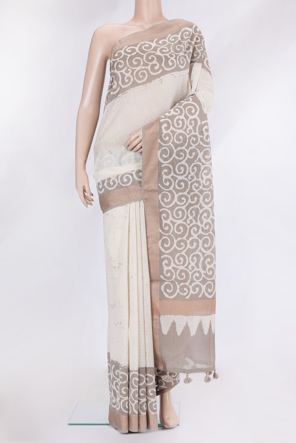 Beige Dual Tone Chanderi Silk Saree with Stripes on the body and Thread Border.  displayed on a mannequin